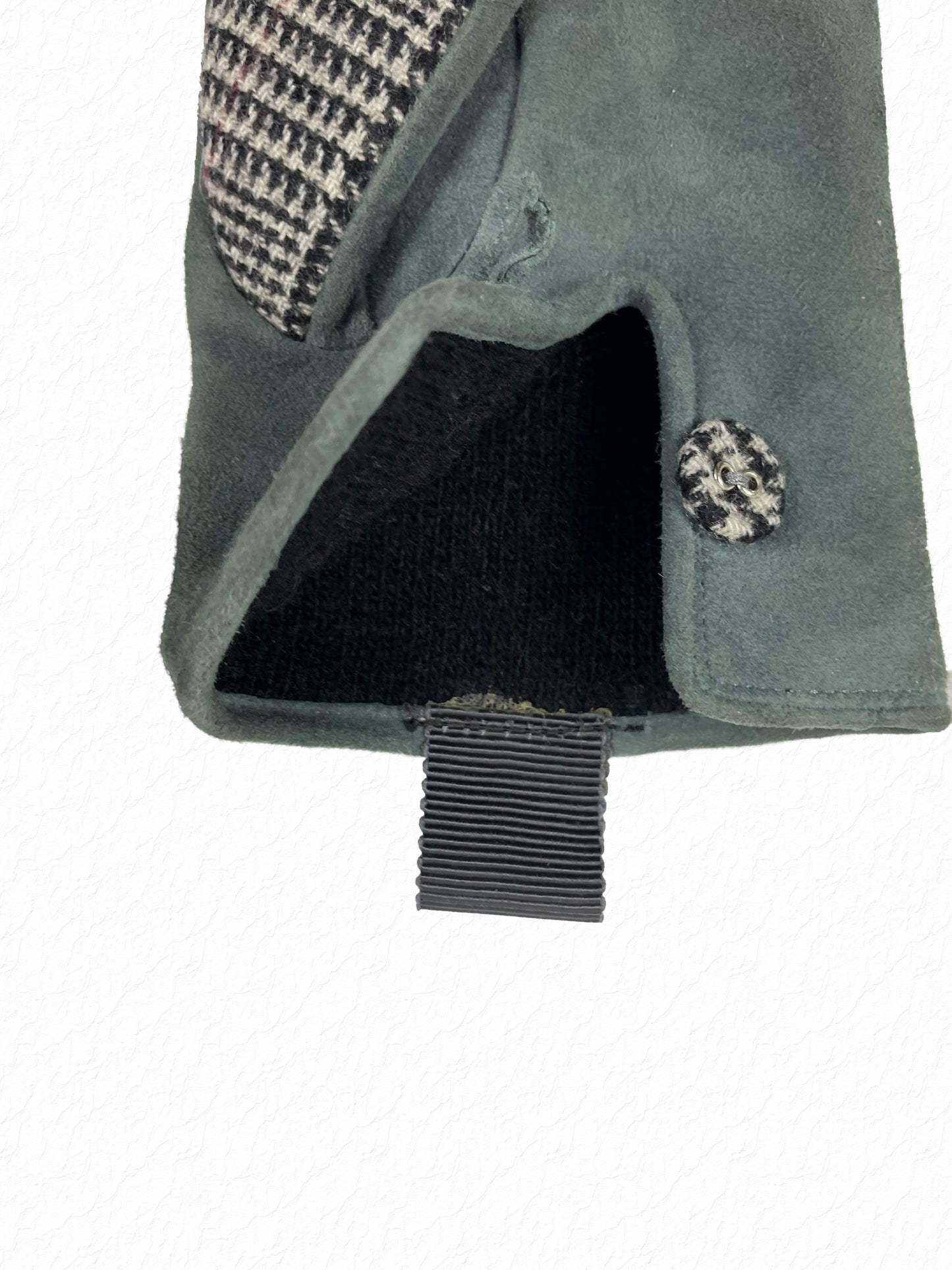 Green suede Thom Browne gloves with grosgrain pull tab and houndstooth button