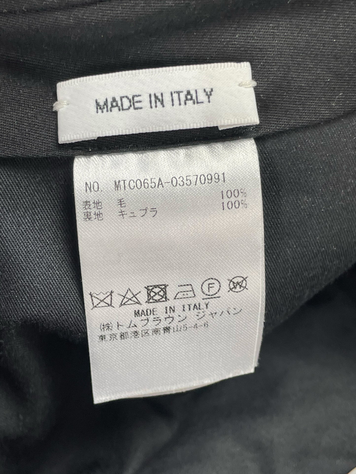 Made in Italy wool construction of Thom Browne tartan plaid trousers