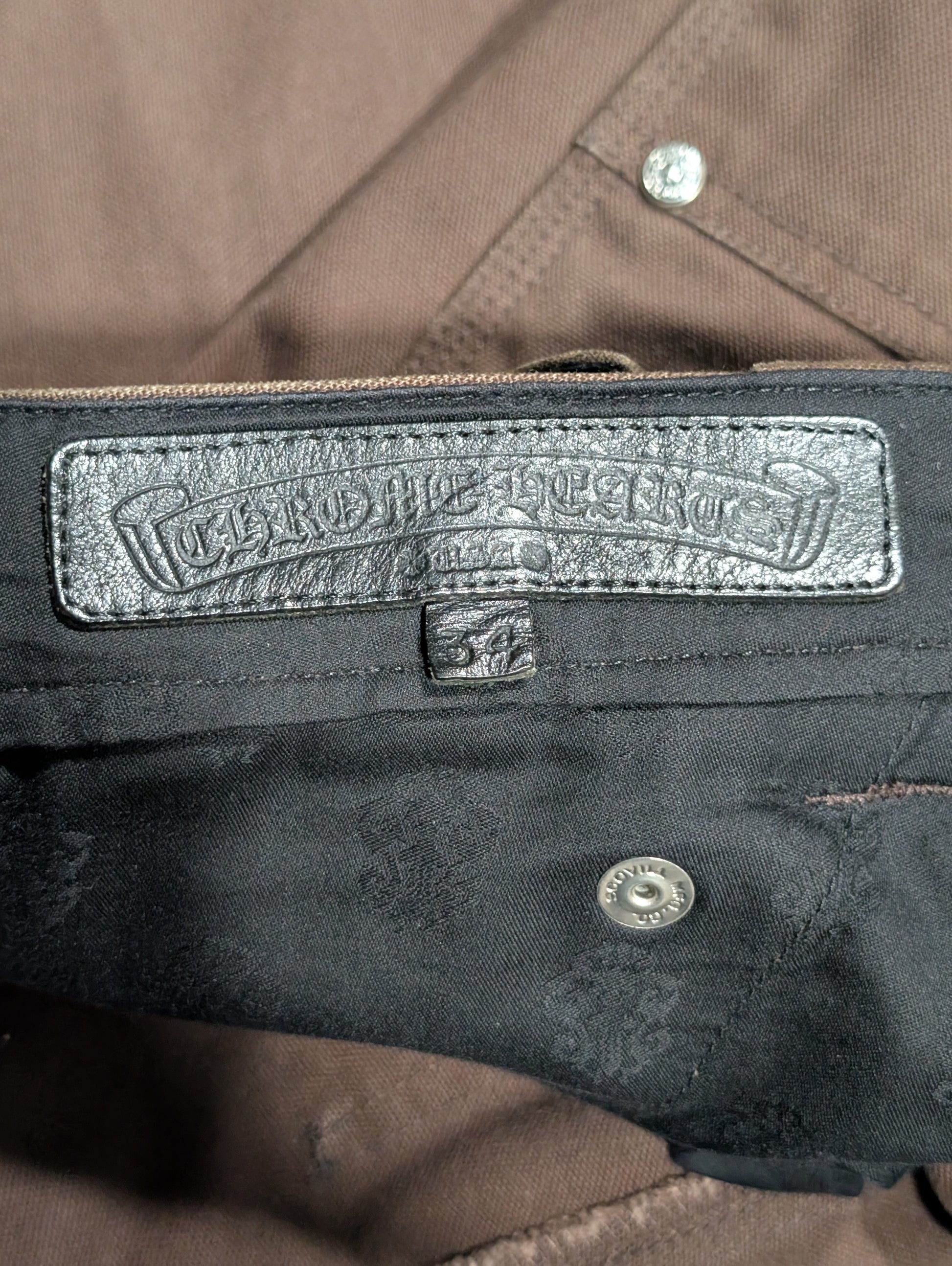 chrome hearts carpenter pants tag detail brown double knee black leather cross patch collectible