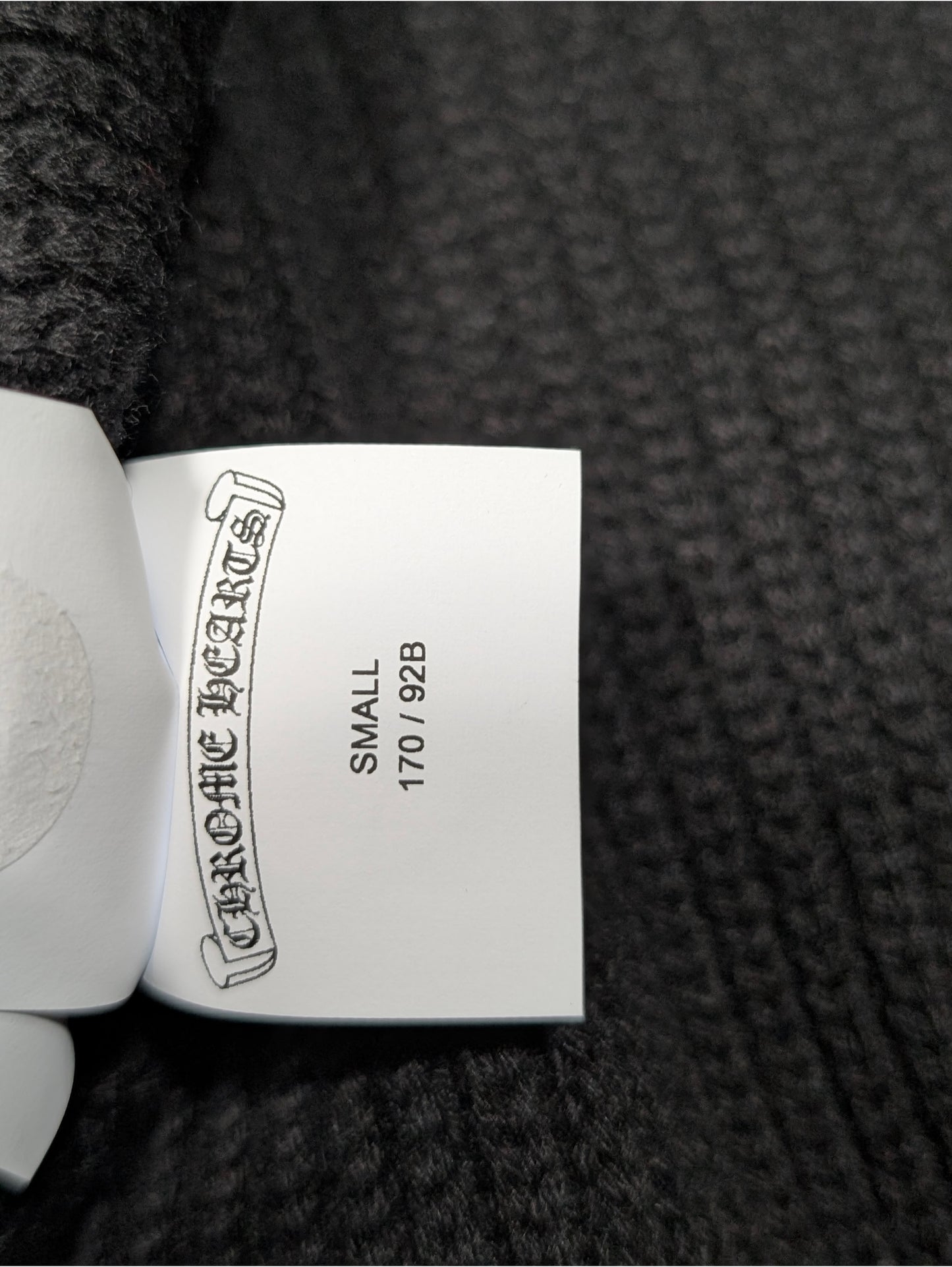 chrome hearts sweater tag