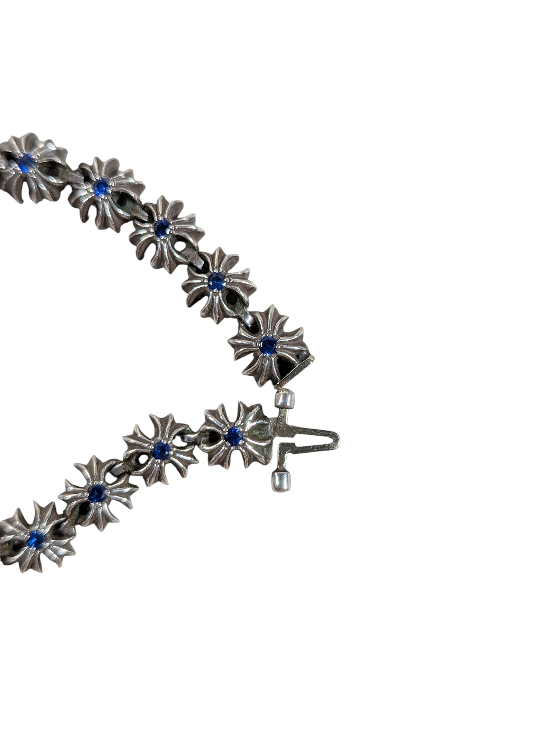 chrome hearts tiny ch plus bracelet close up sterling silver 925 blue sapphire gemstone detail