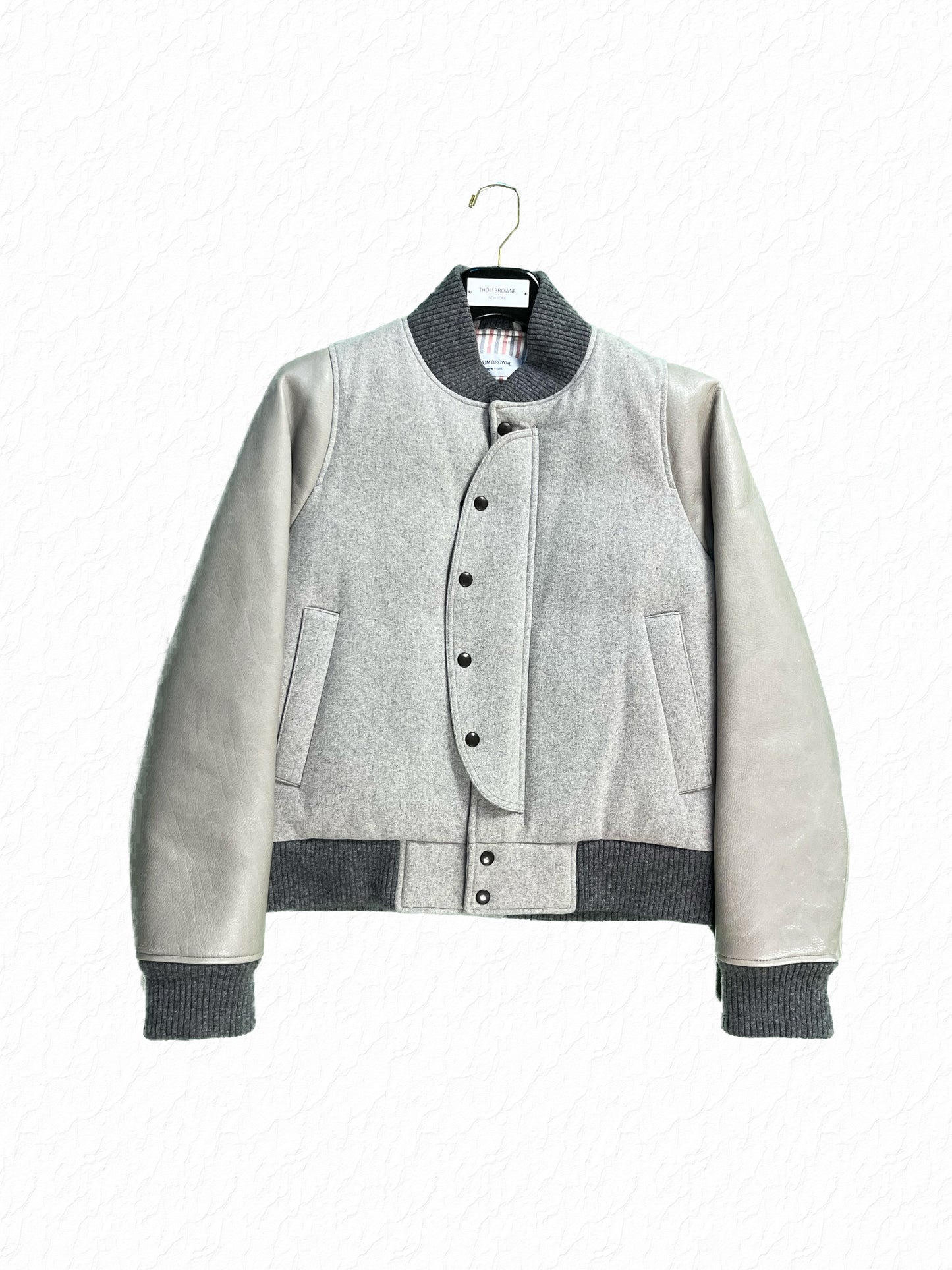Grey Wool Flannel Letterman Jacket by Thom Browne with Leather Sleeves