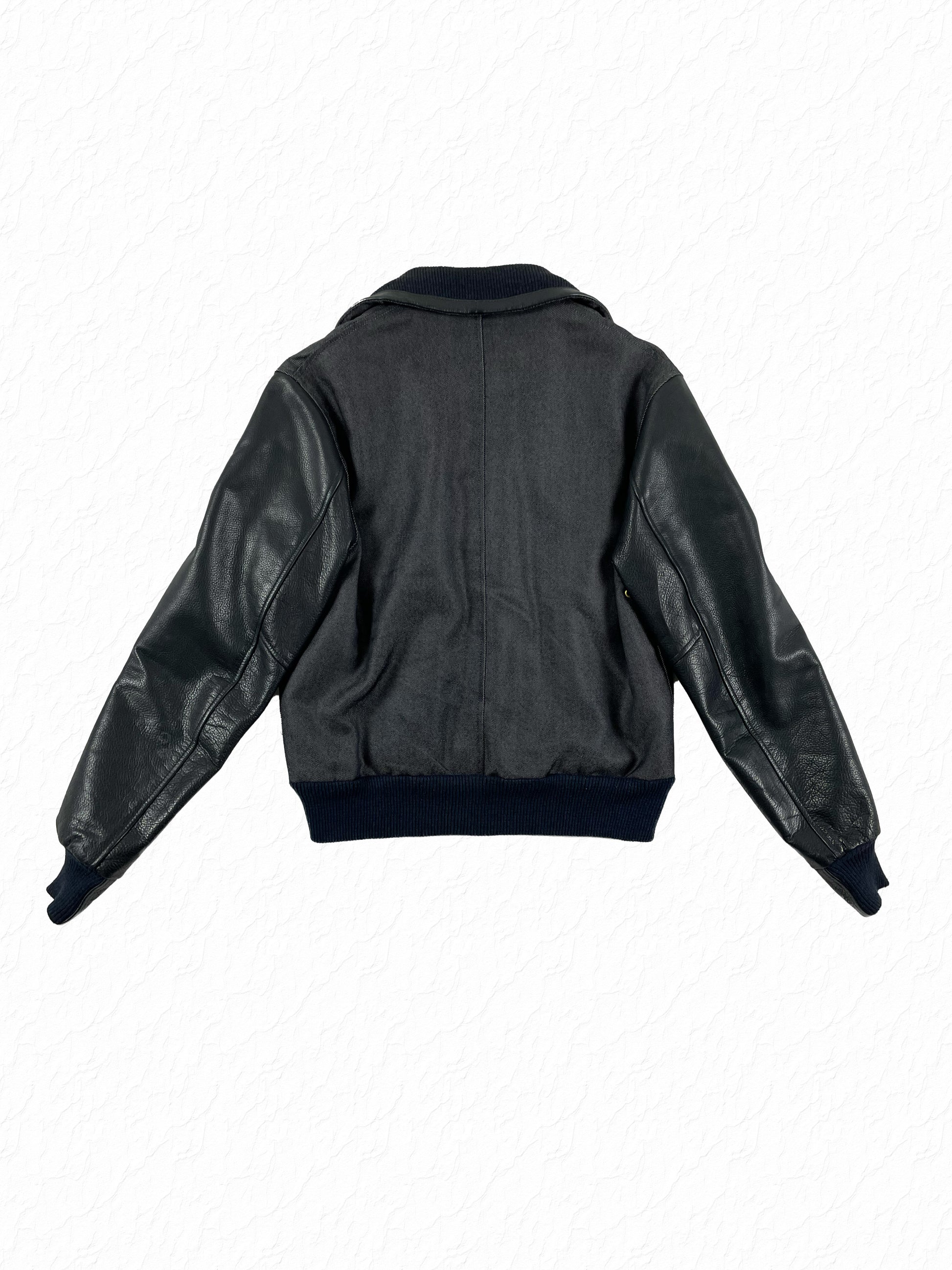 Black leather sleeve varsity jacket by Thom Browne in navy denim