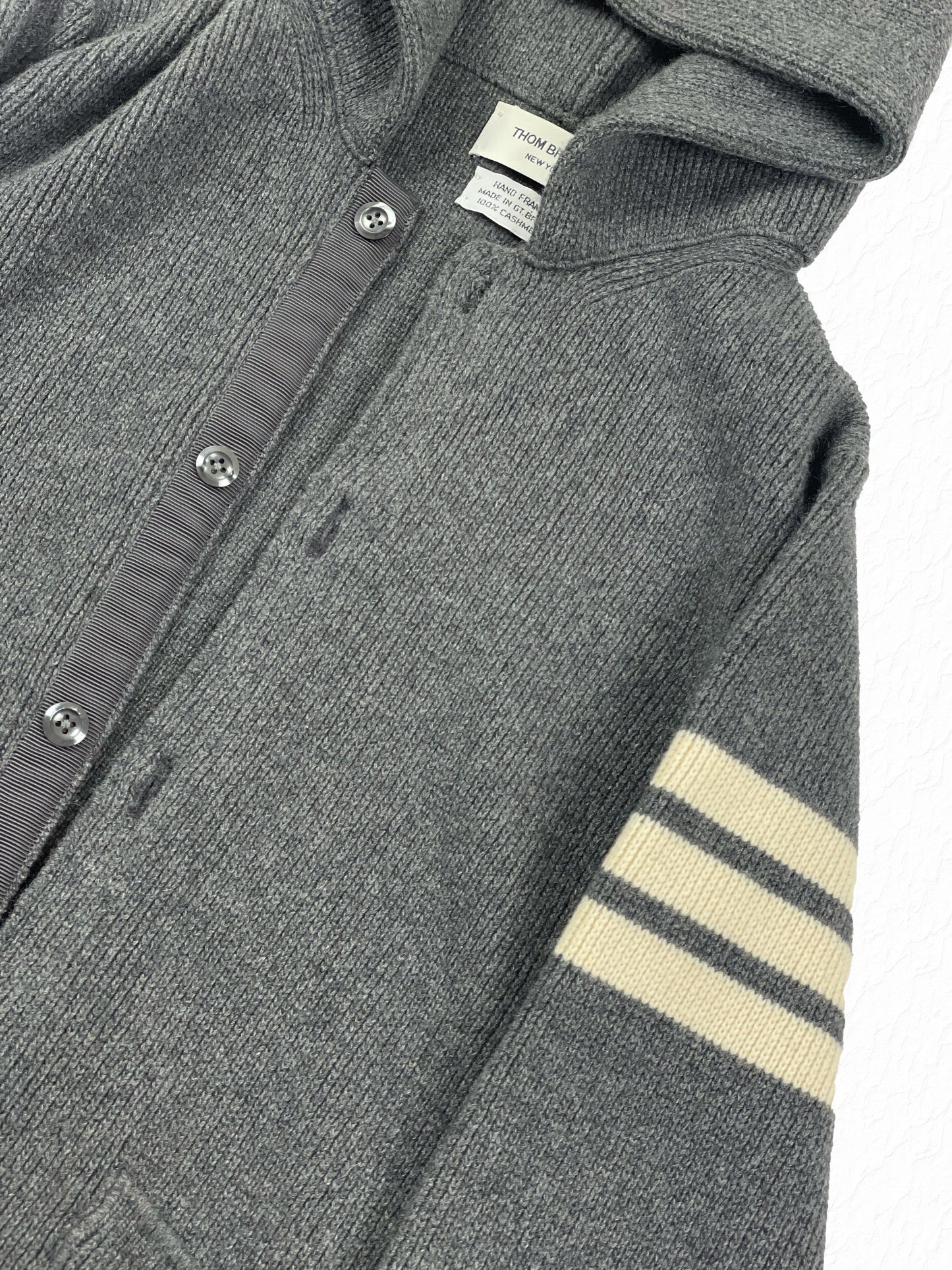Cream 4-bar sleeve stripe on Thom Browne grey cashmere hooded cardigan