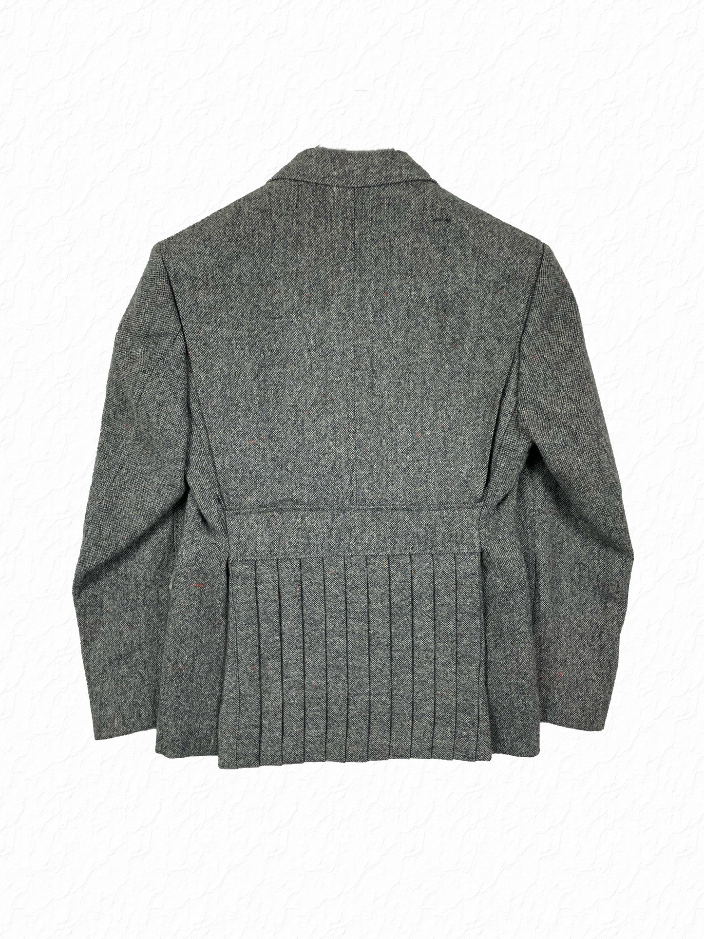 Pleated vent on Thom Browne grey tweed sport coat Fall 2007