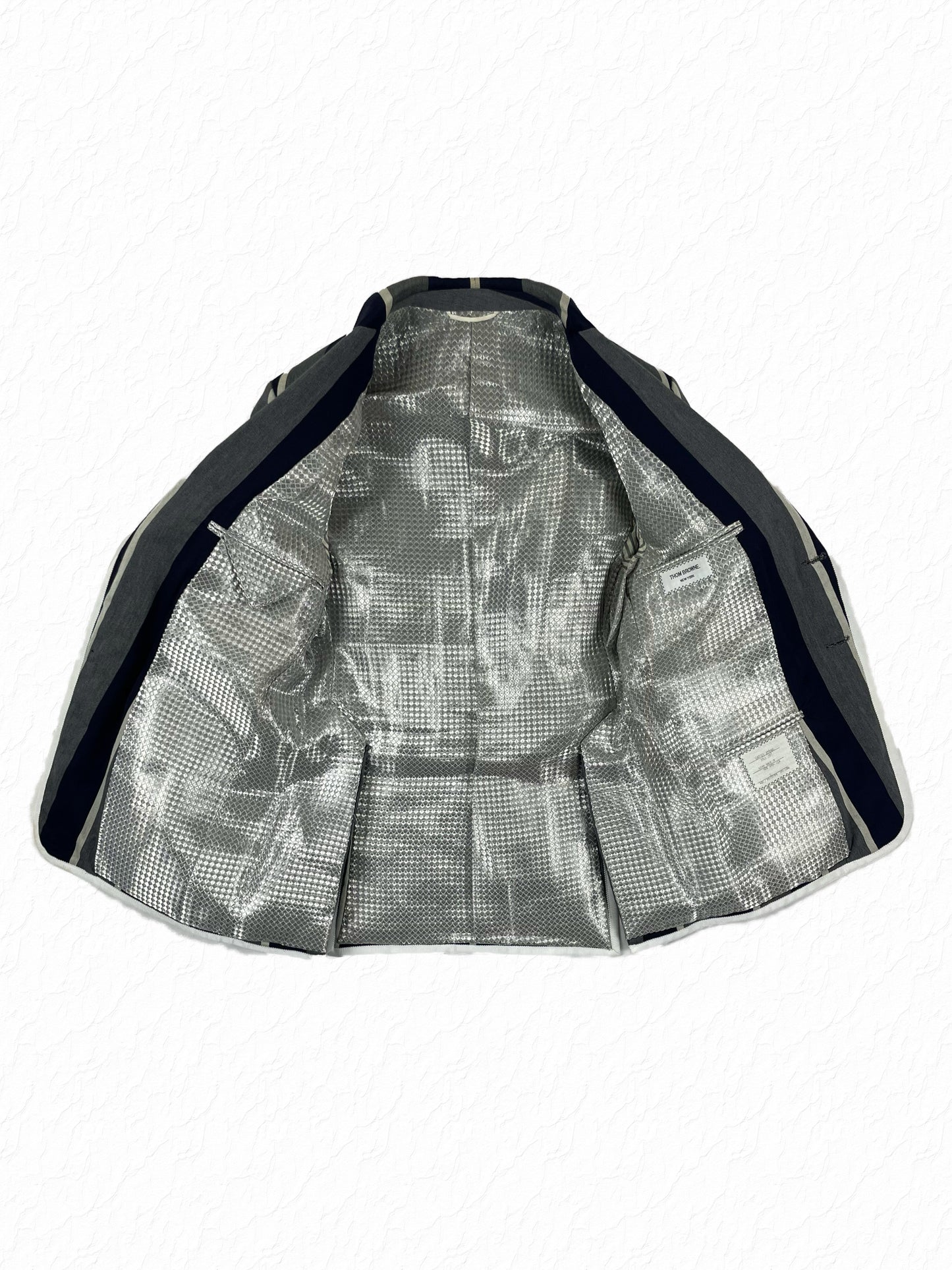 Metallic prism lining inside Thom Browne United Arrows Fall 2007 blazer