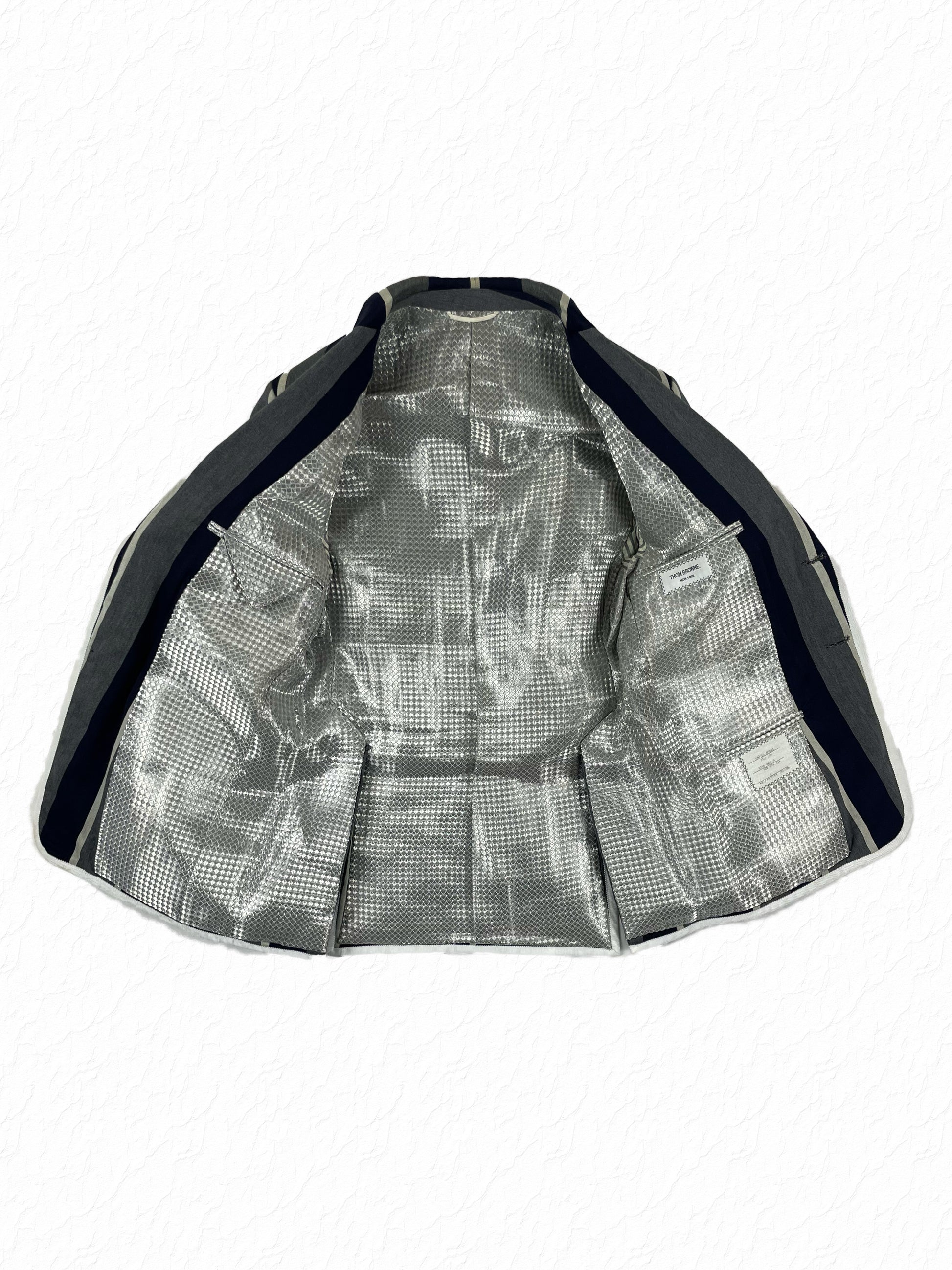 Metallic prism lining inside Thom Browne United Arrows Fall 2007 blazer