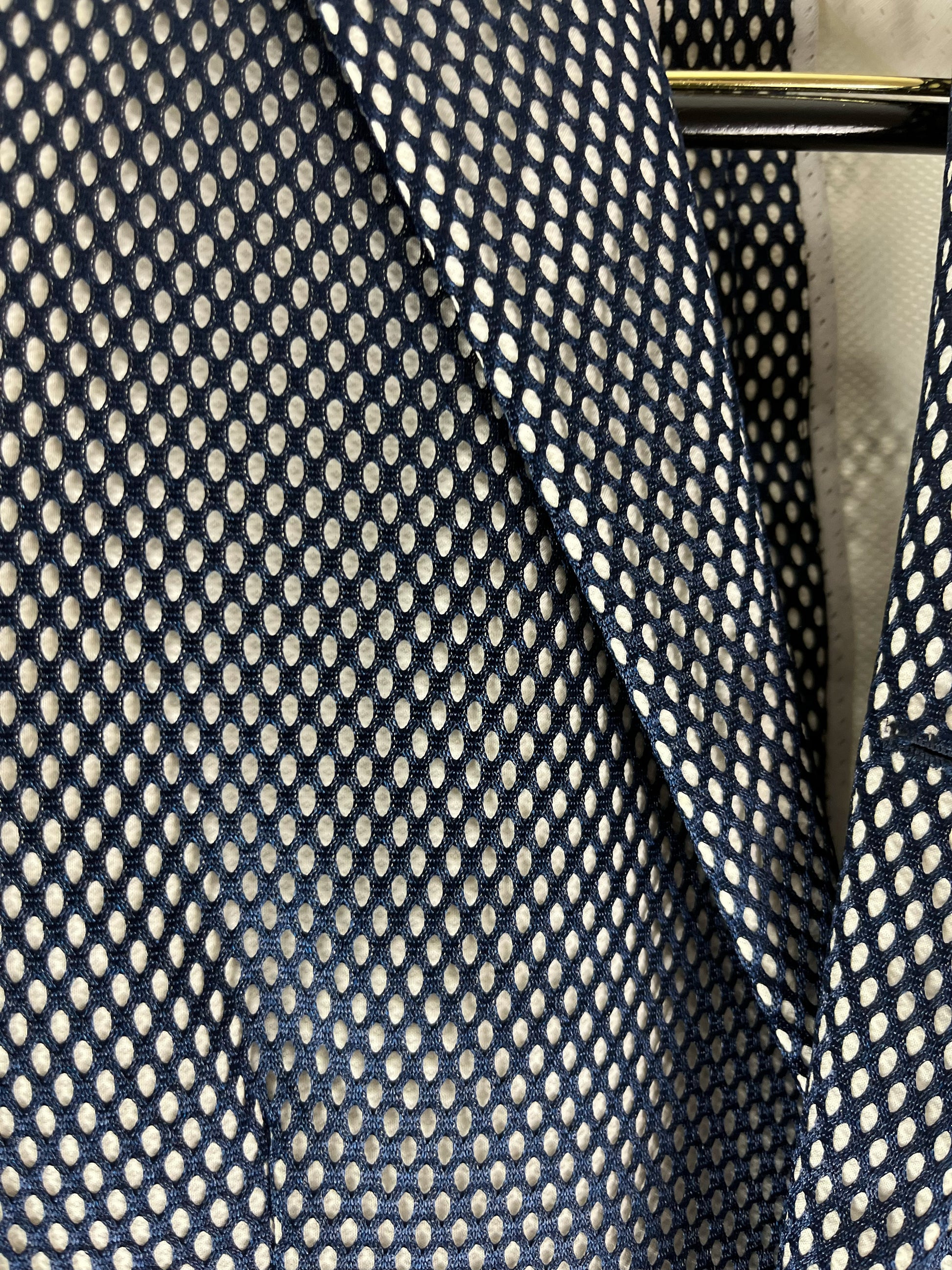 Navy open-weave mesh texture on Thom Browne Marcella suit