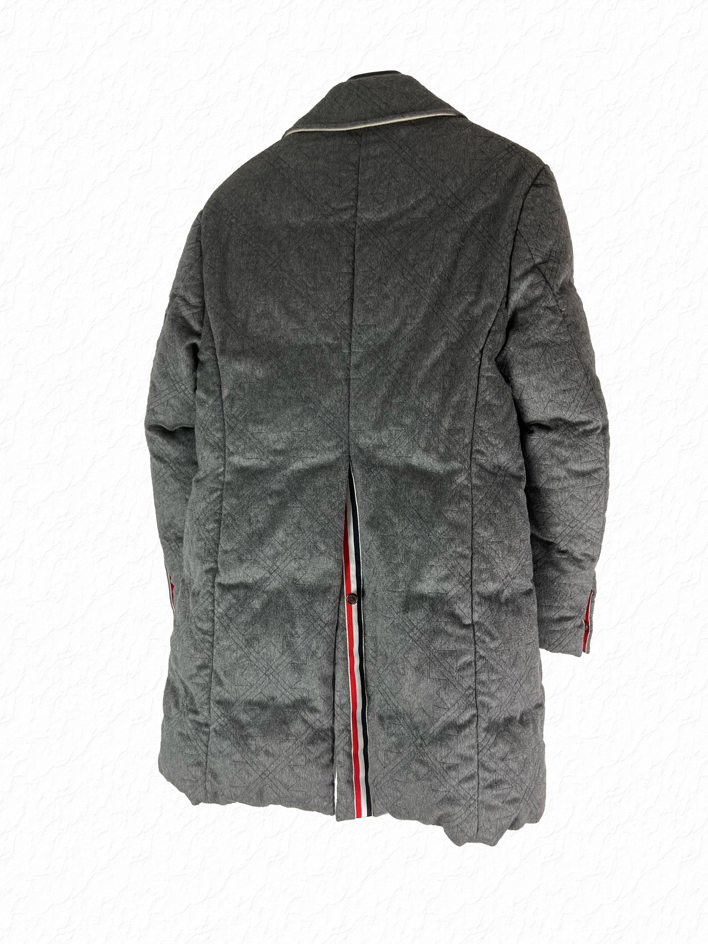 Signature red white and blue grosgrain placket on Thom Browne Chesterfield coat