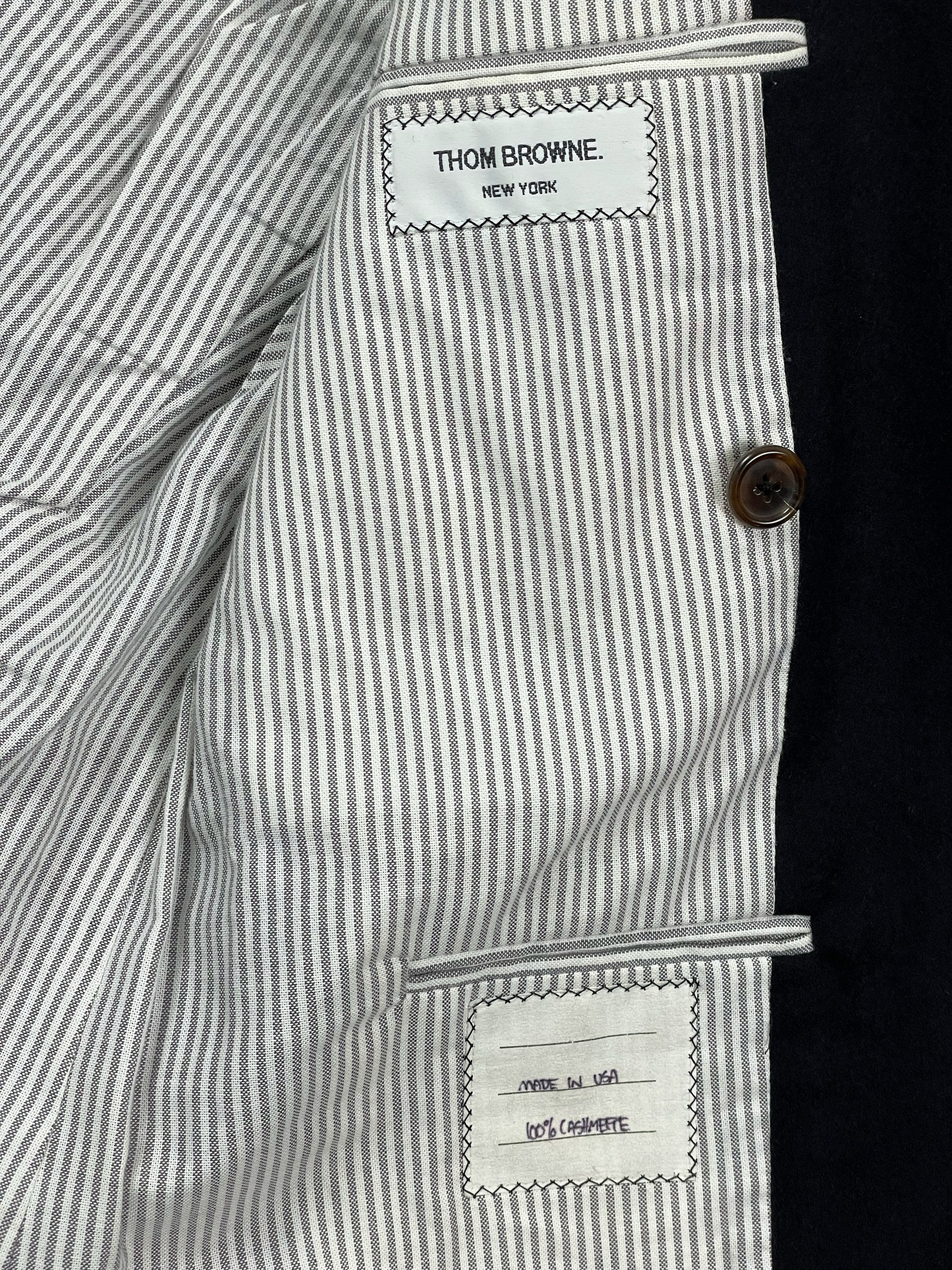 Red white blue grosgrain trim on Thom Browne cashmere blazer