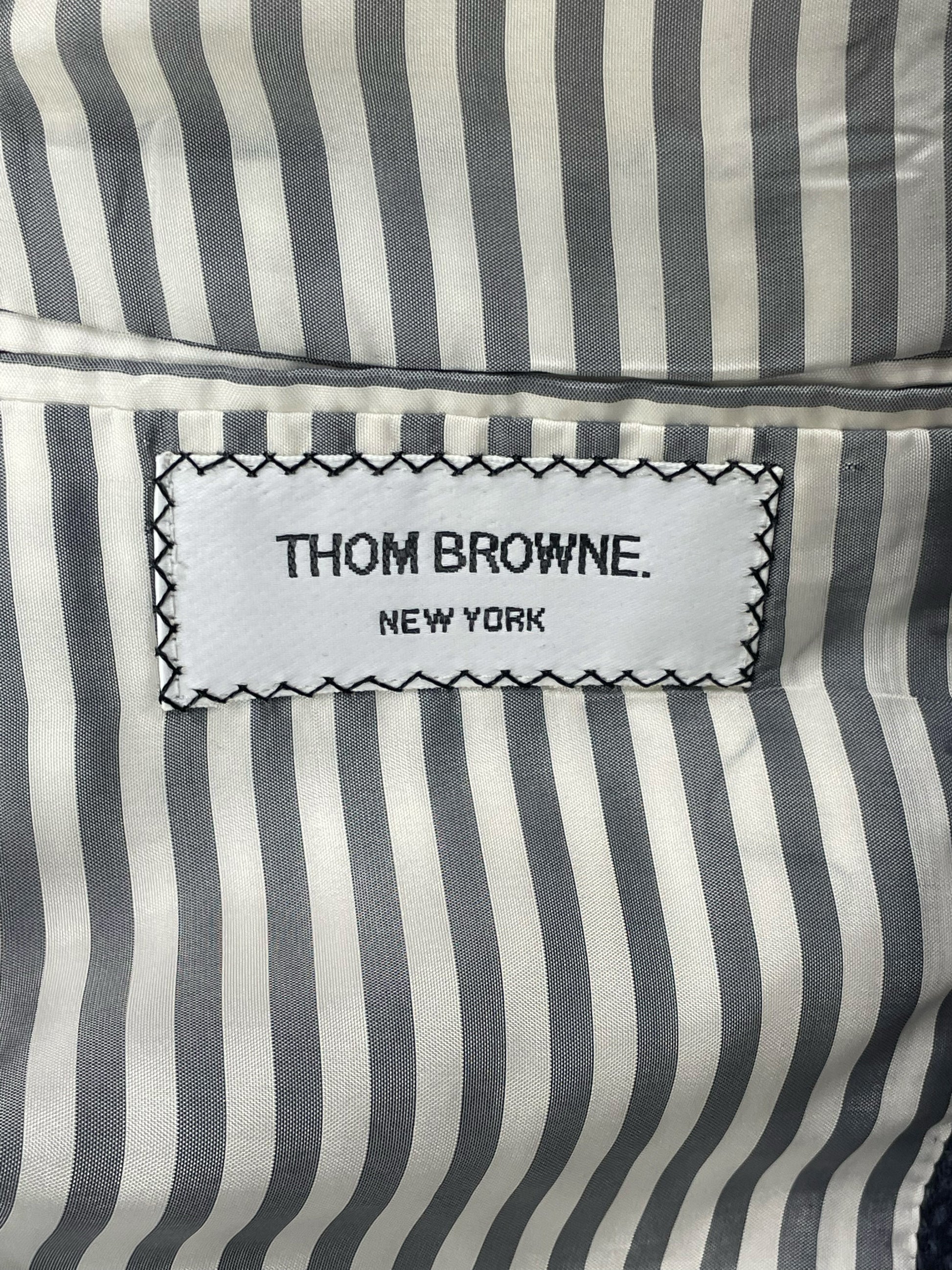 Thom Browne New York striped lining inside navy Donegal tweed jacket