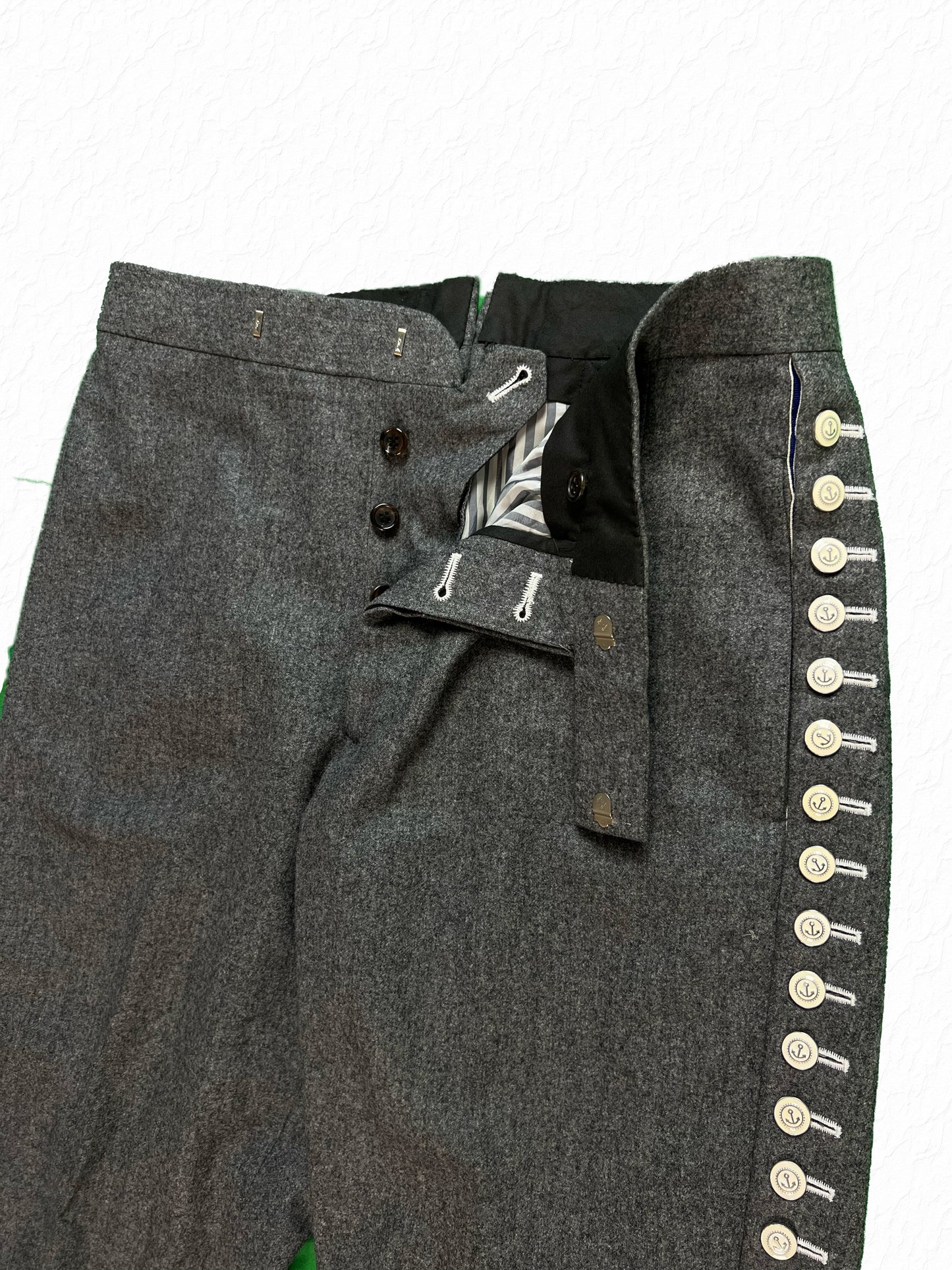 Anchor button leg closure on Thom Browne Fall 2008 flannel trousers