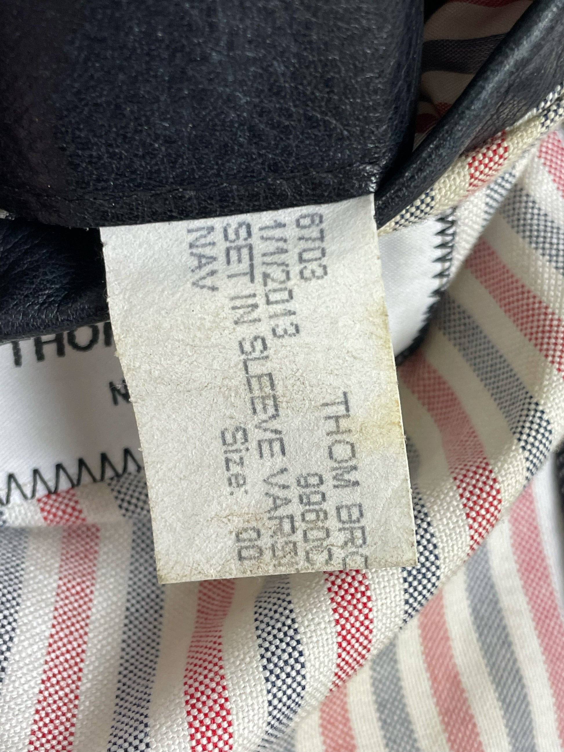 Navy denim varsity jacket Thom Browne gold snap closure