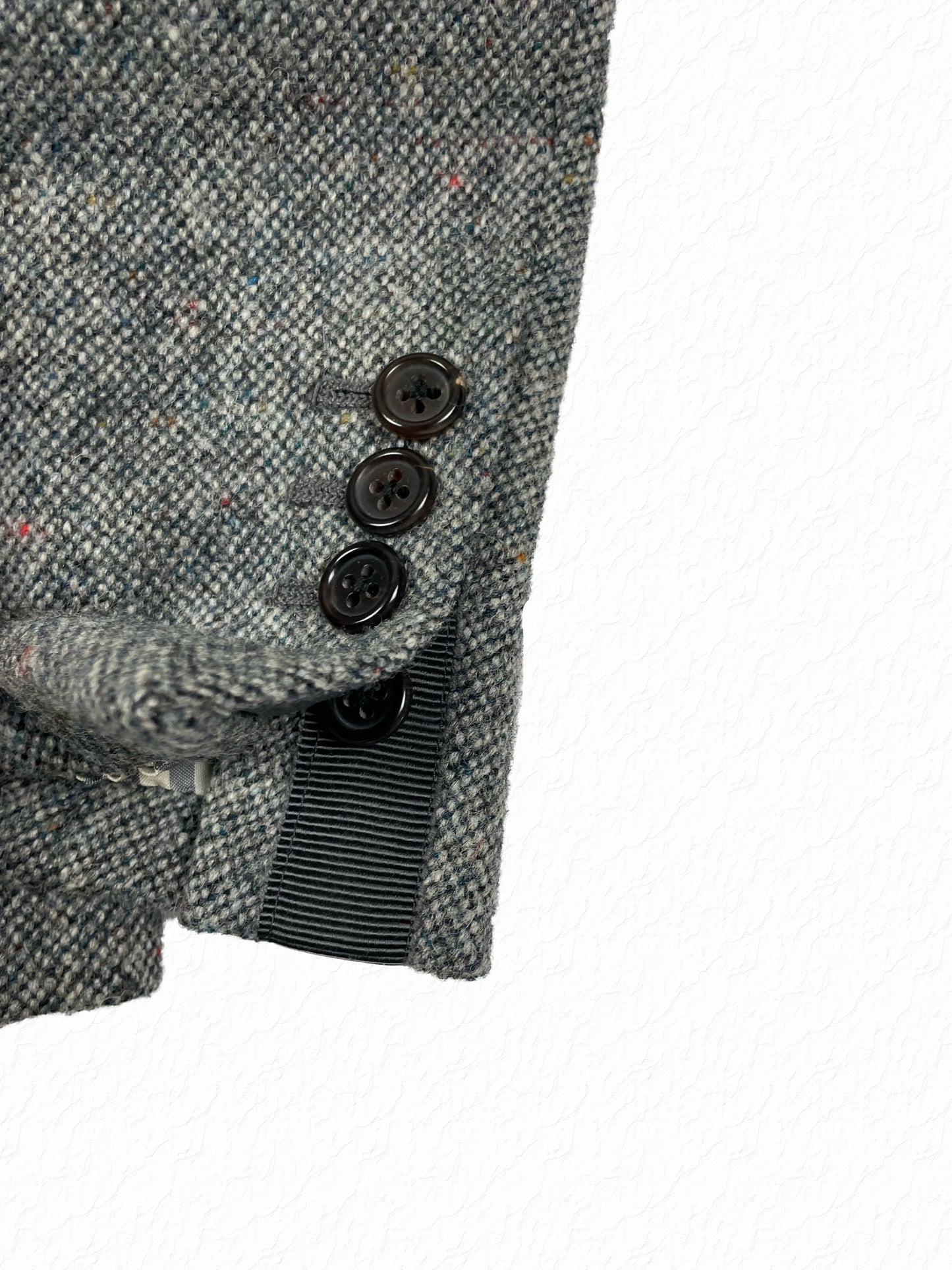 Tweed sleeve buttons on archival Thom Browne grey sport coat