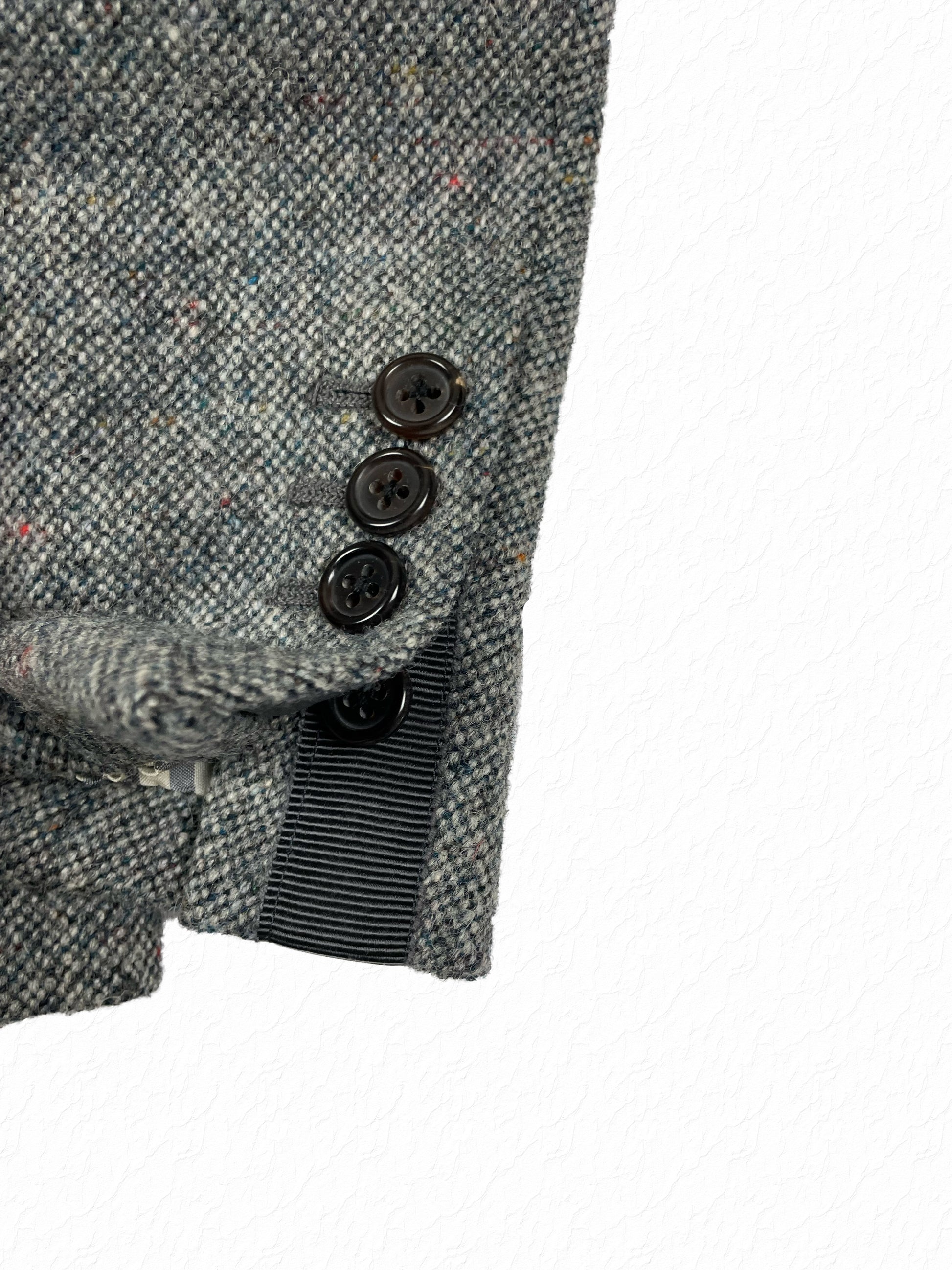 Tweed sleeve buttons on archival Thom Browne grey sport coat