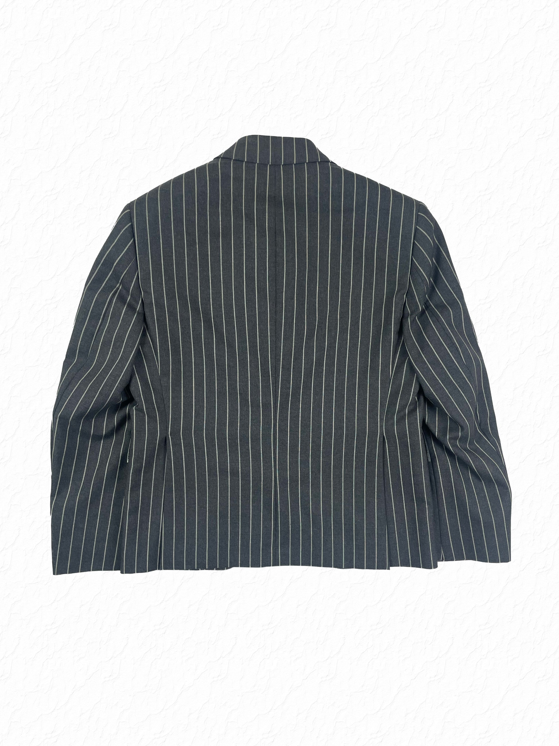 Signature RWB tricolor grosgrain tab on Thom Browne wool blazer