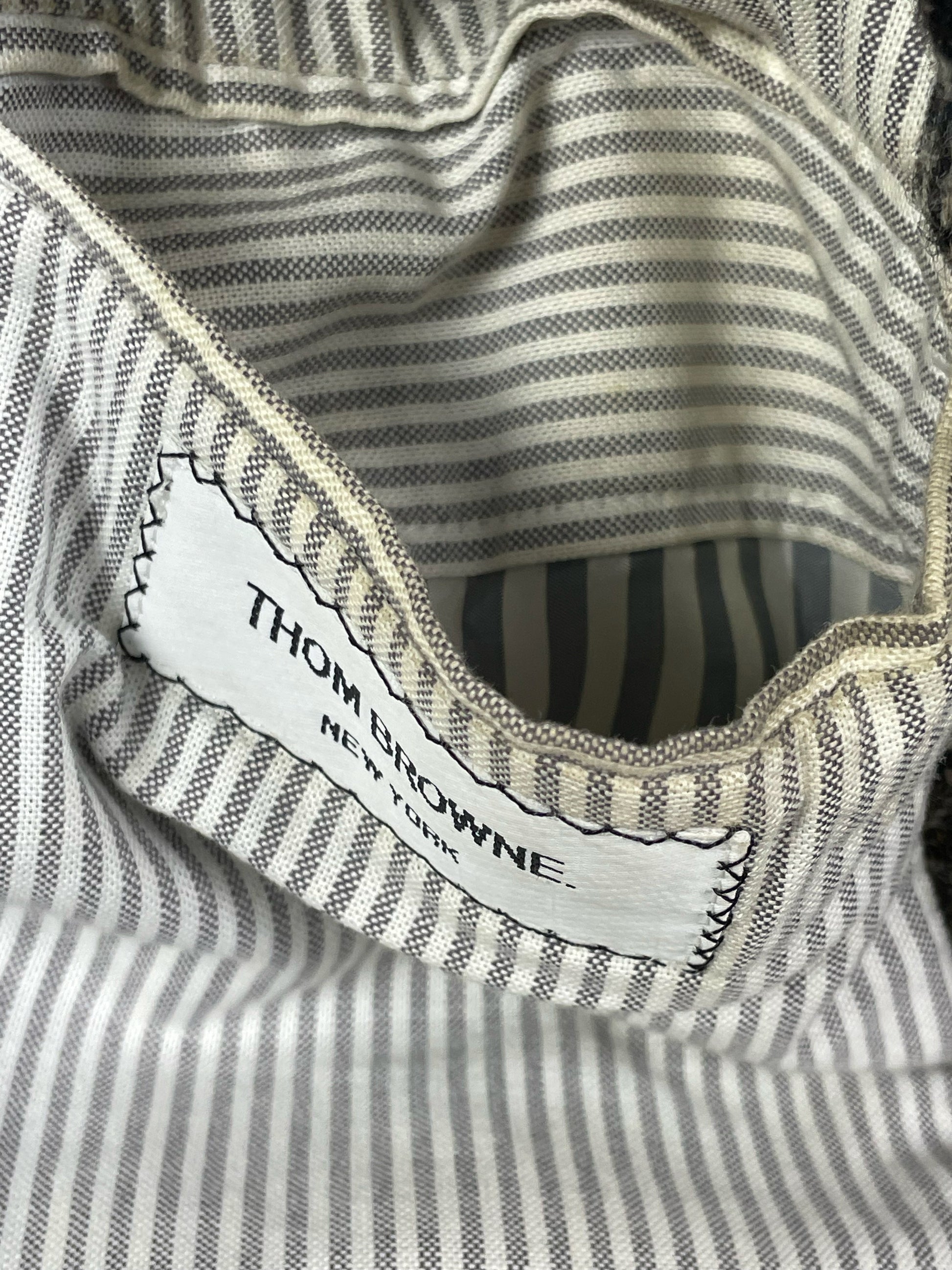 Grosgrain interior label Thom Browne houndstooth wool jacket