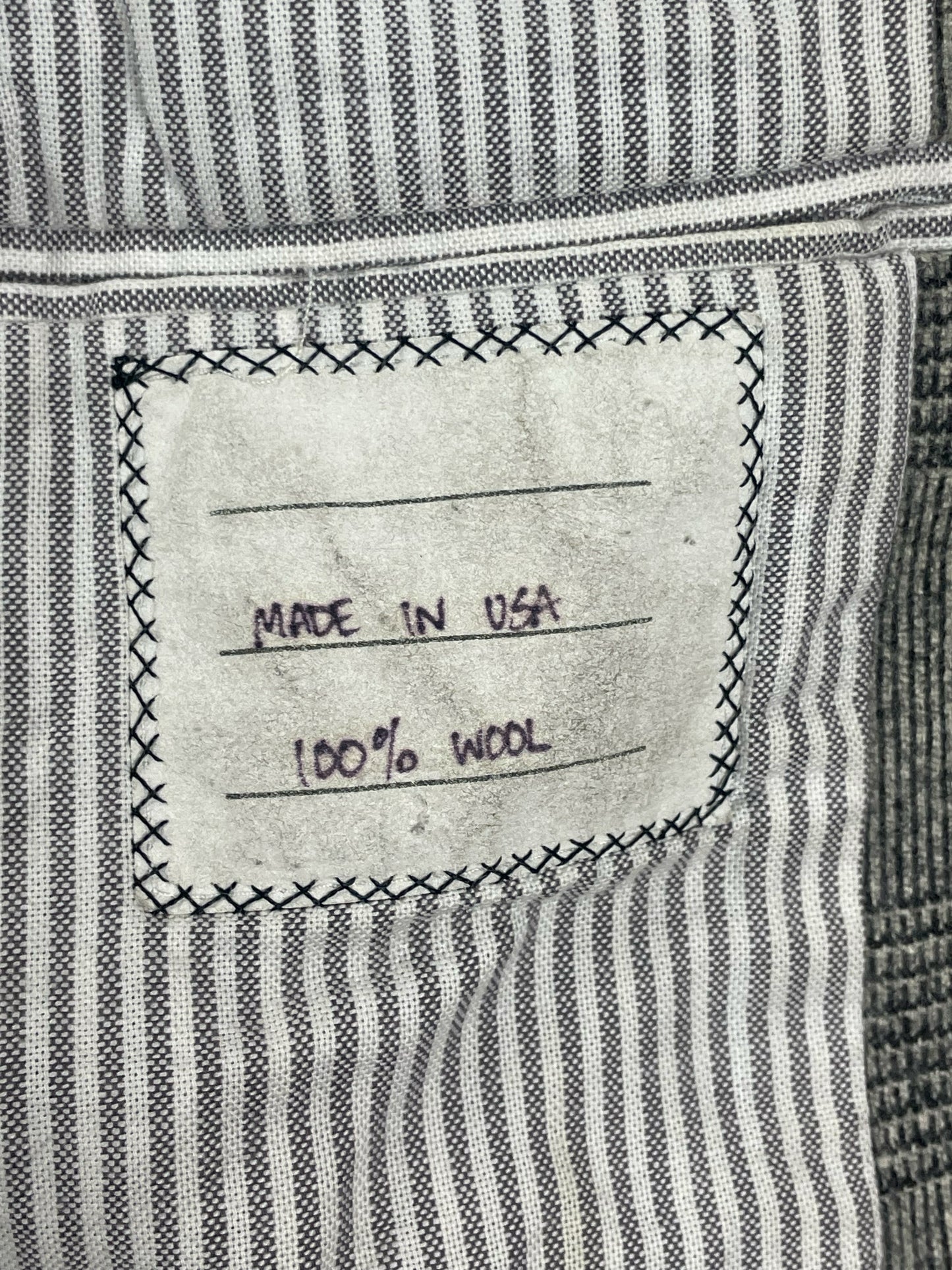 Made in USA grey wool tailoring by Thom Browne New York