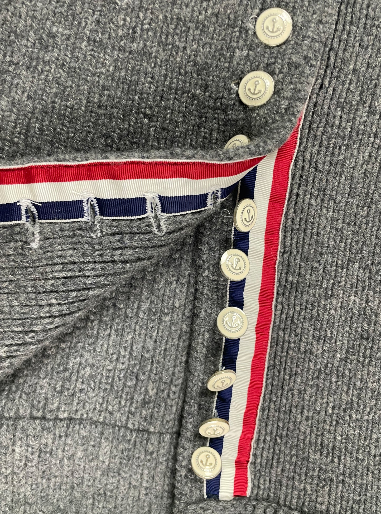 Thom Browne cashmere cape with nautical anchor buttons and RWB grosgrain trim