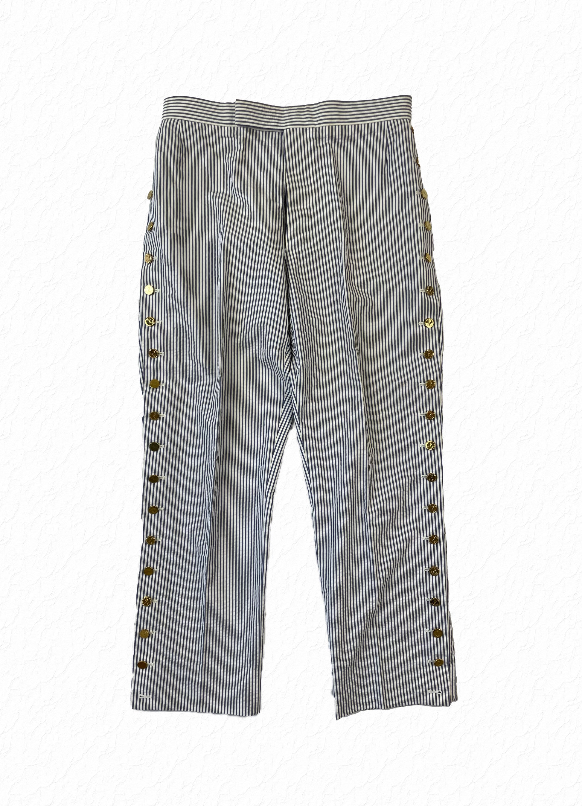 Thom Browne blue seersucker pants with gold anchor buttons running the full leg