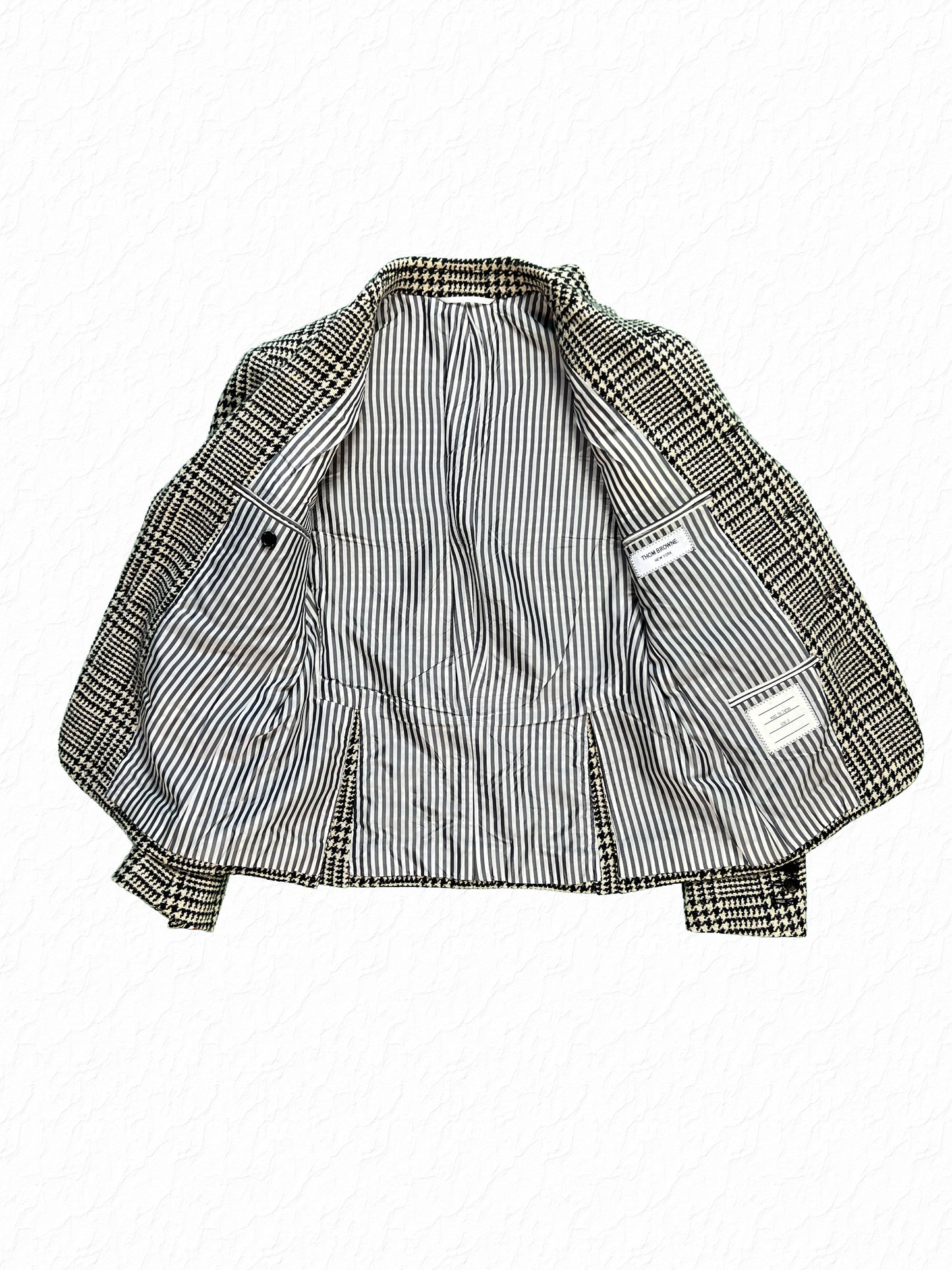 Striped cotton lining inside Thom Browne Glen Plaid tweed high armhole blazer