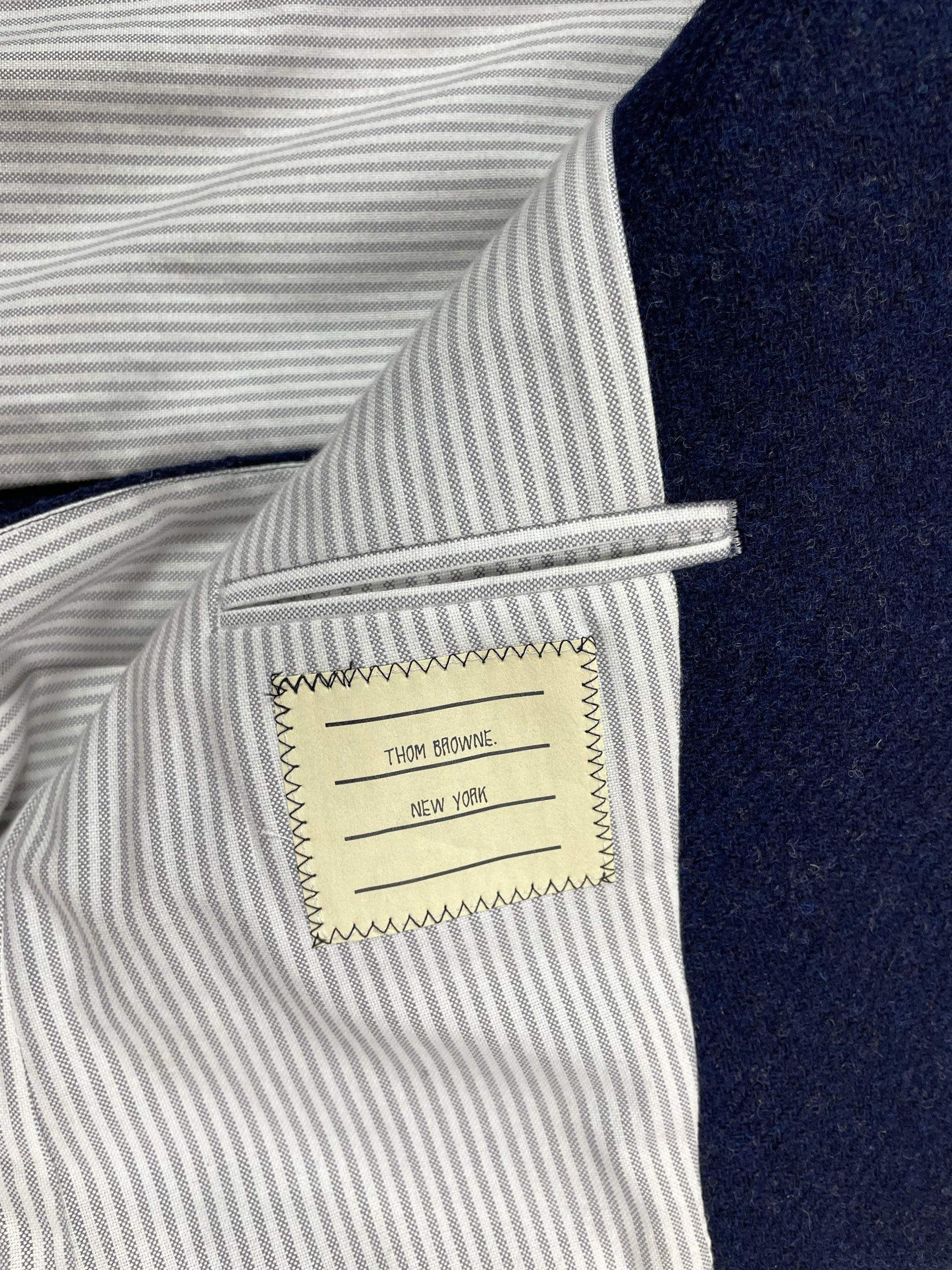 Thom Browne New York striped cotton lining on navy tweed jacket