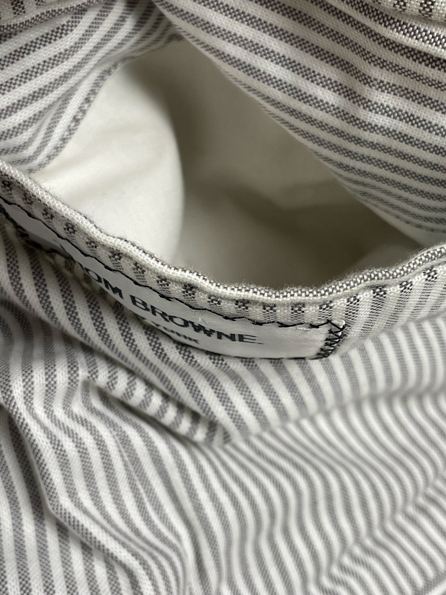 Grosgrain interior binding on archival Thom Browne tweed jacket