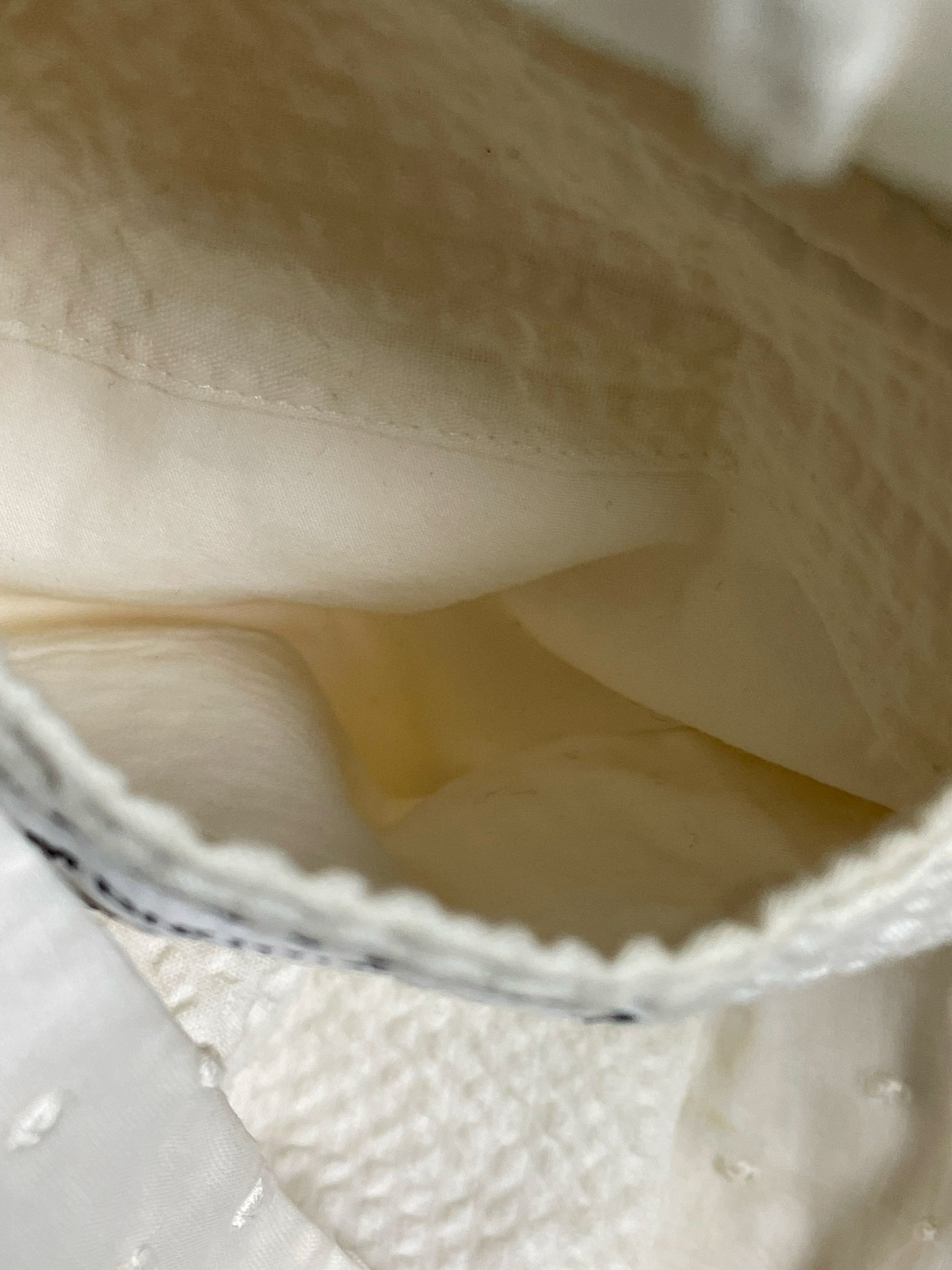 Cotton lining interior of Thom Browne Swiss dot white blazer