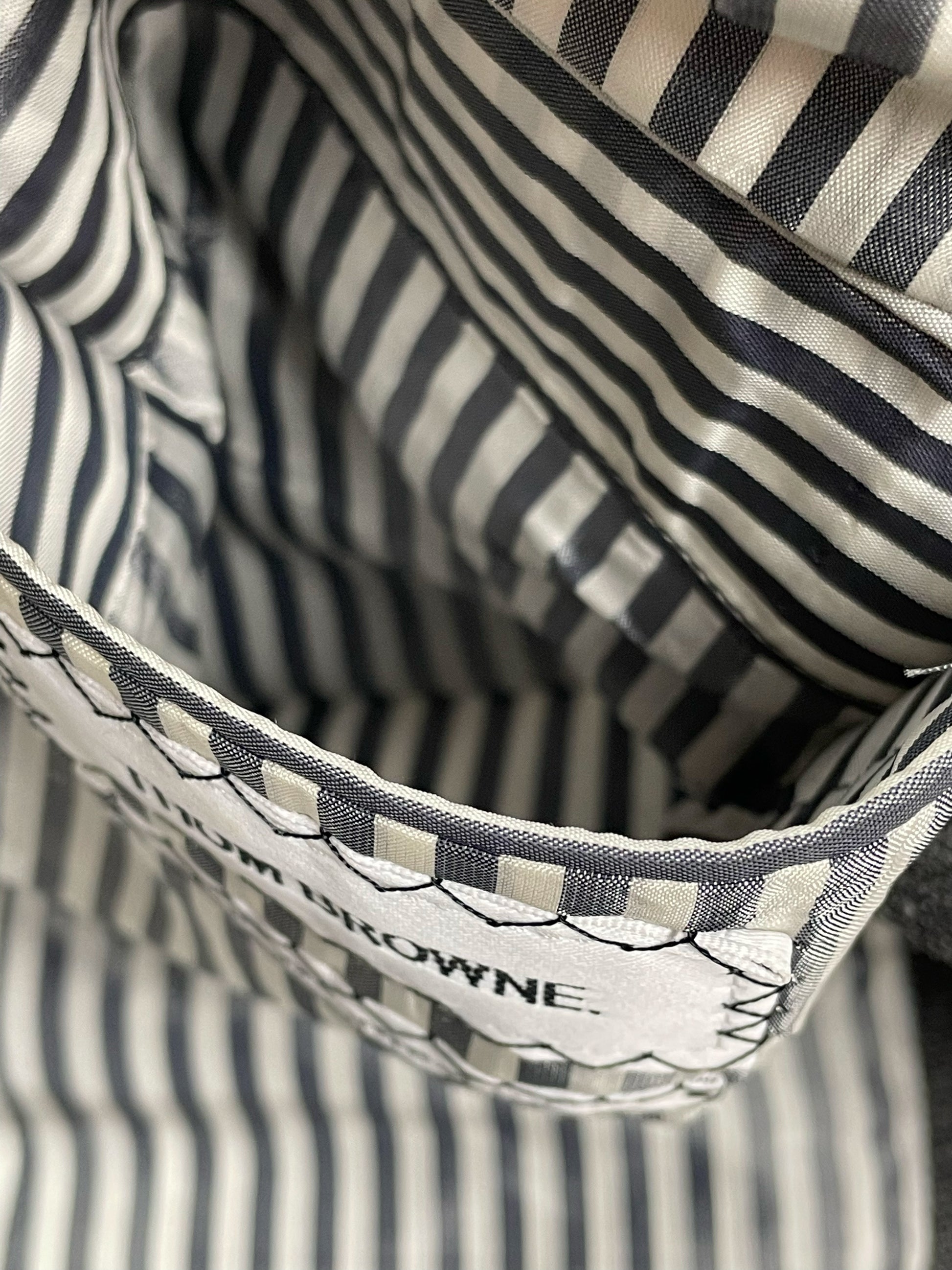 Signature grosgrain trim inside Thom Browne hopsack wool sport coat