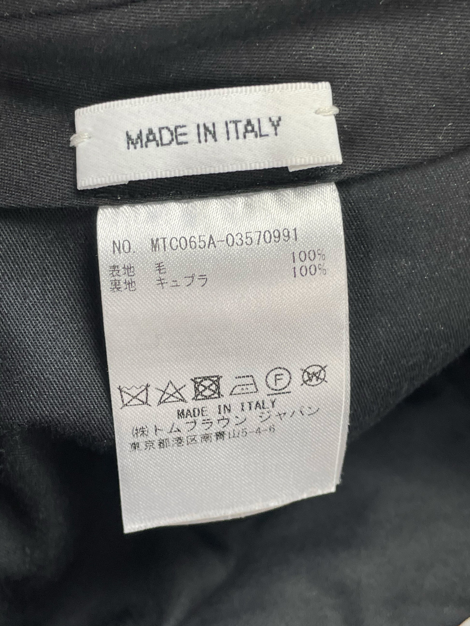 Made in Italy wool construction of Thom Browne tartan plaid trousers