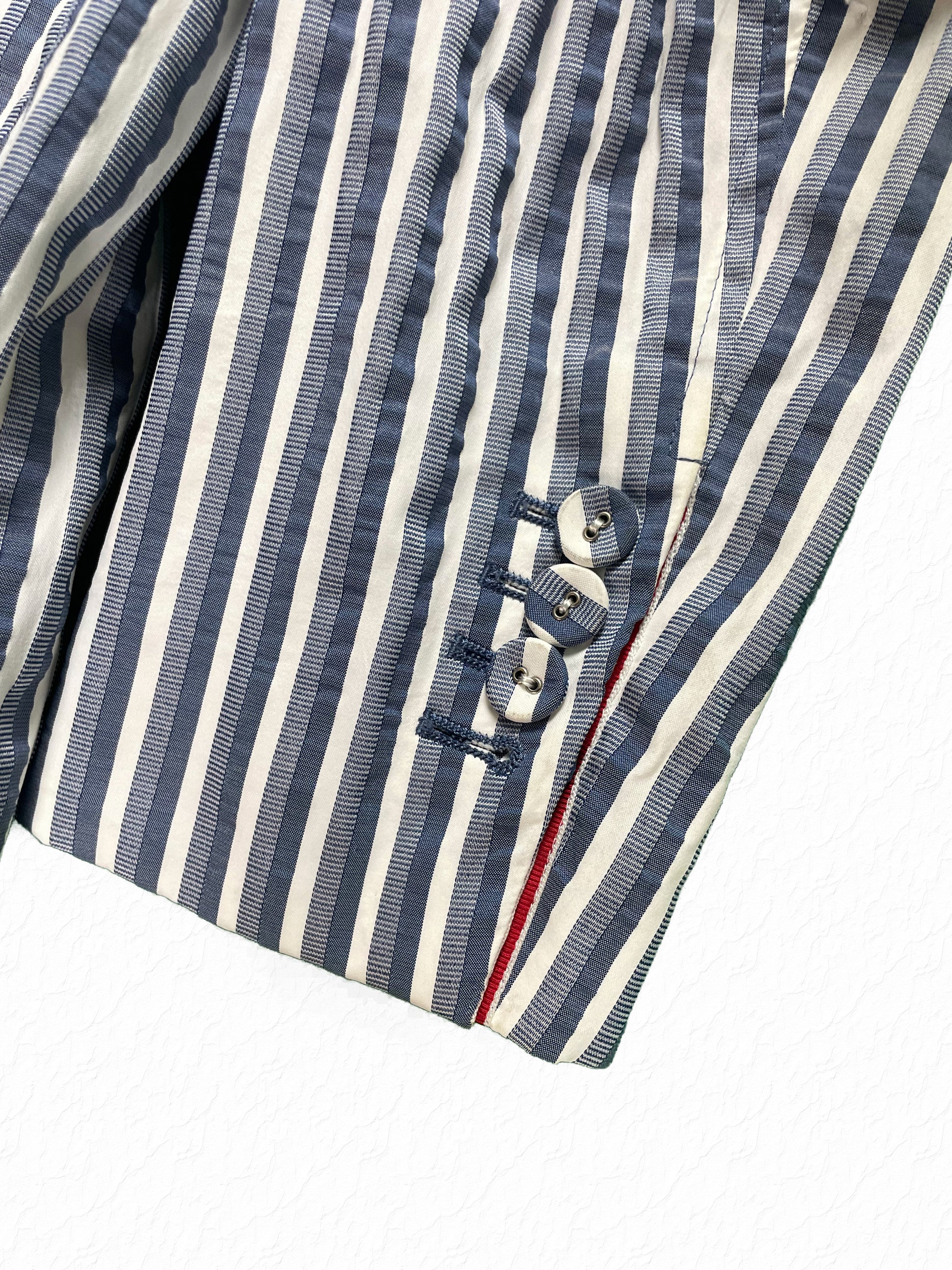 Striped nylon sport coat by Thom Browne with RWB grosgrain placket