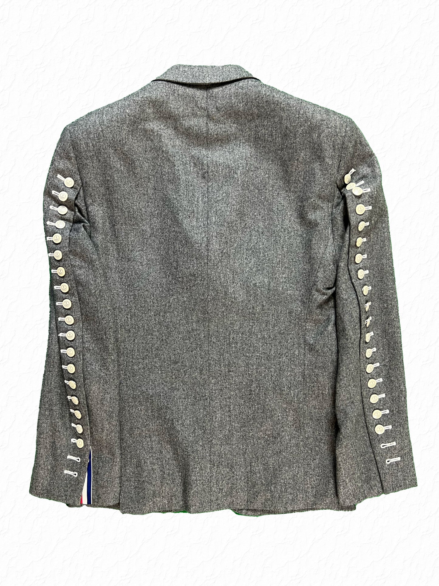 Thom Browne grey flannel blazer with anchor buttons lining each sleeve
