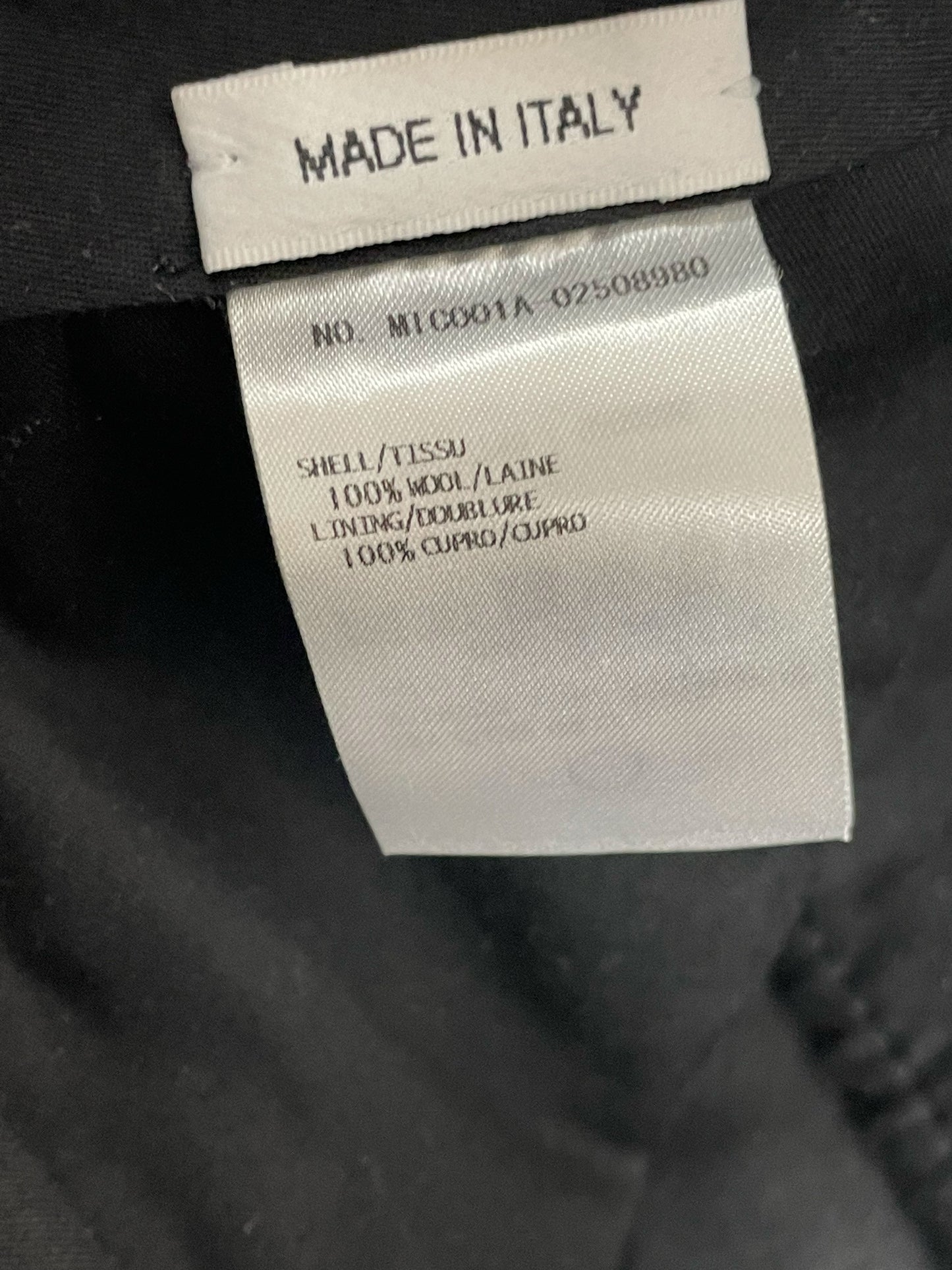 Signature Thom Browne New York label on Harris Tweed trousers