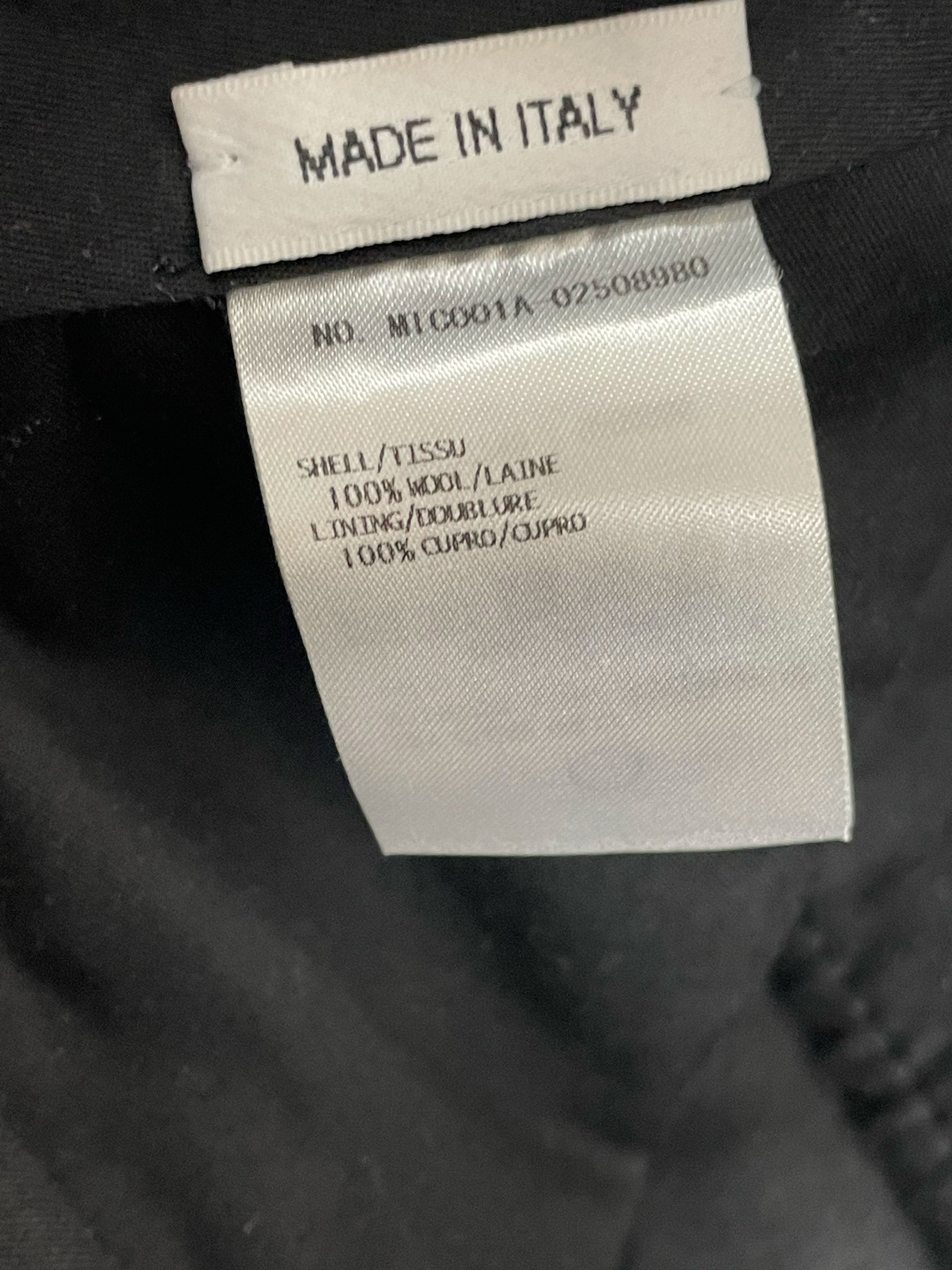 Signature Thom Browne New York label on Harris Tweed trousers