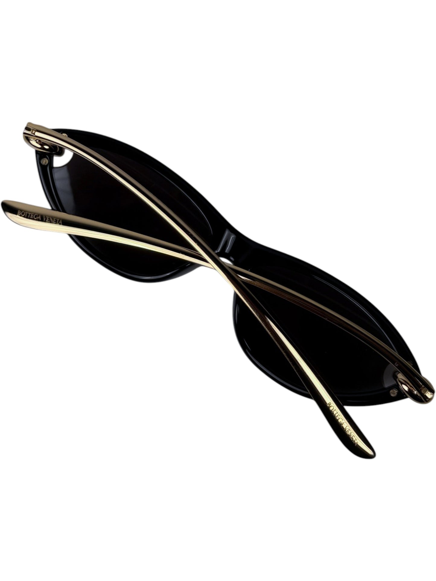 Folded Bottega Veneta Knot black cat eye sunglasses with gold temples