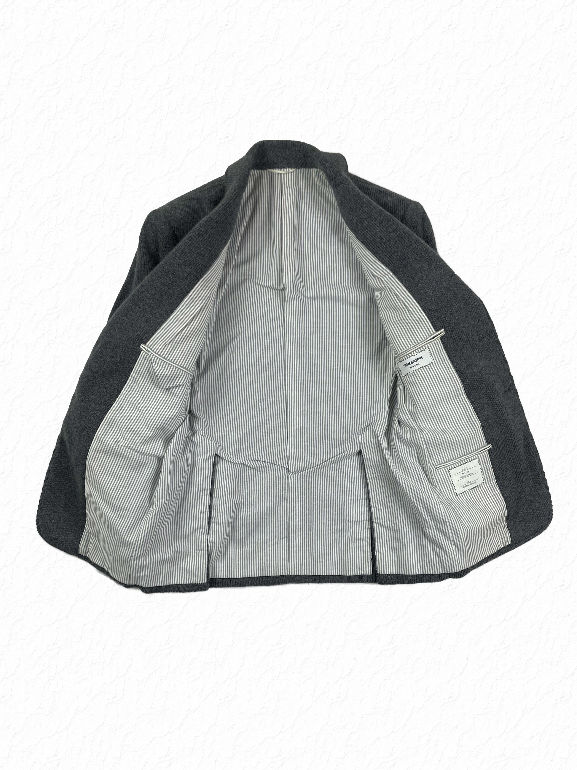 Grey striped cotton lining inside Thom Browne cashmere jacket
