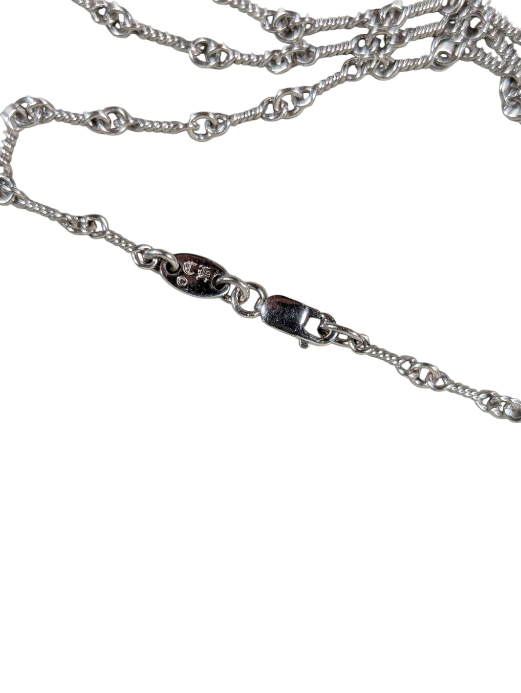 chrome hearts 18 inch white gold twist chain close up necklace chain jewelry detail