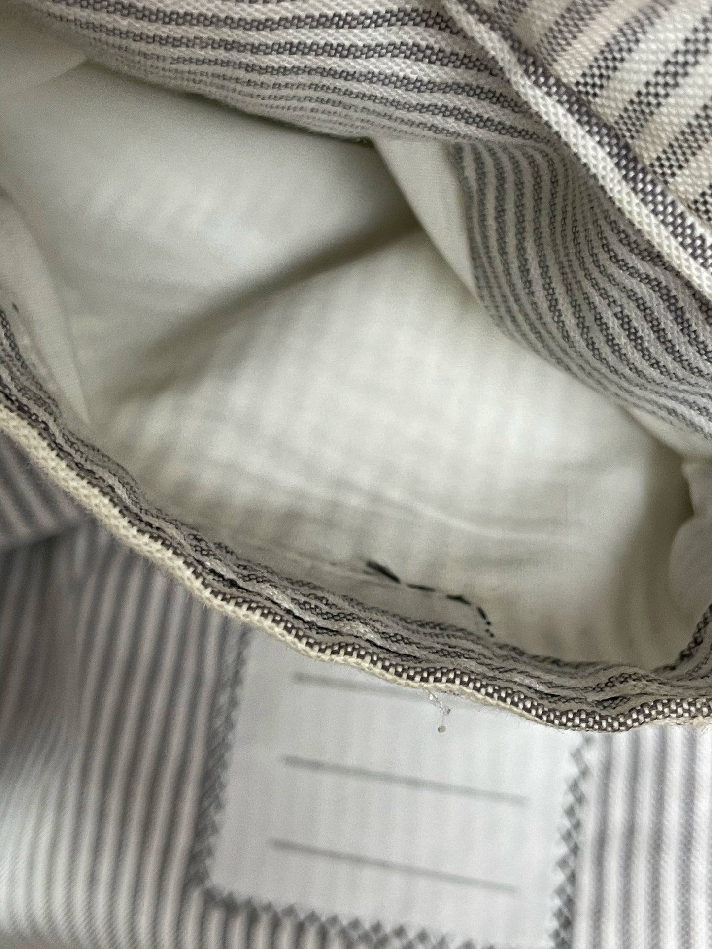 Ticking stripe cotton lining of Thom Browne hooded car coat