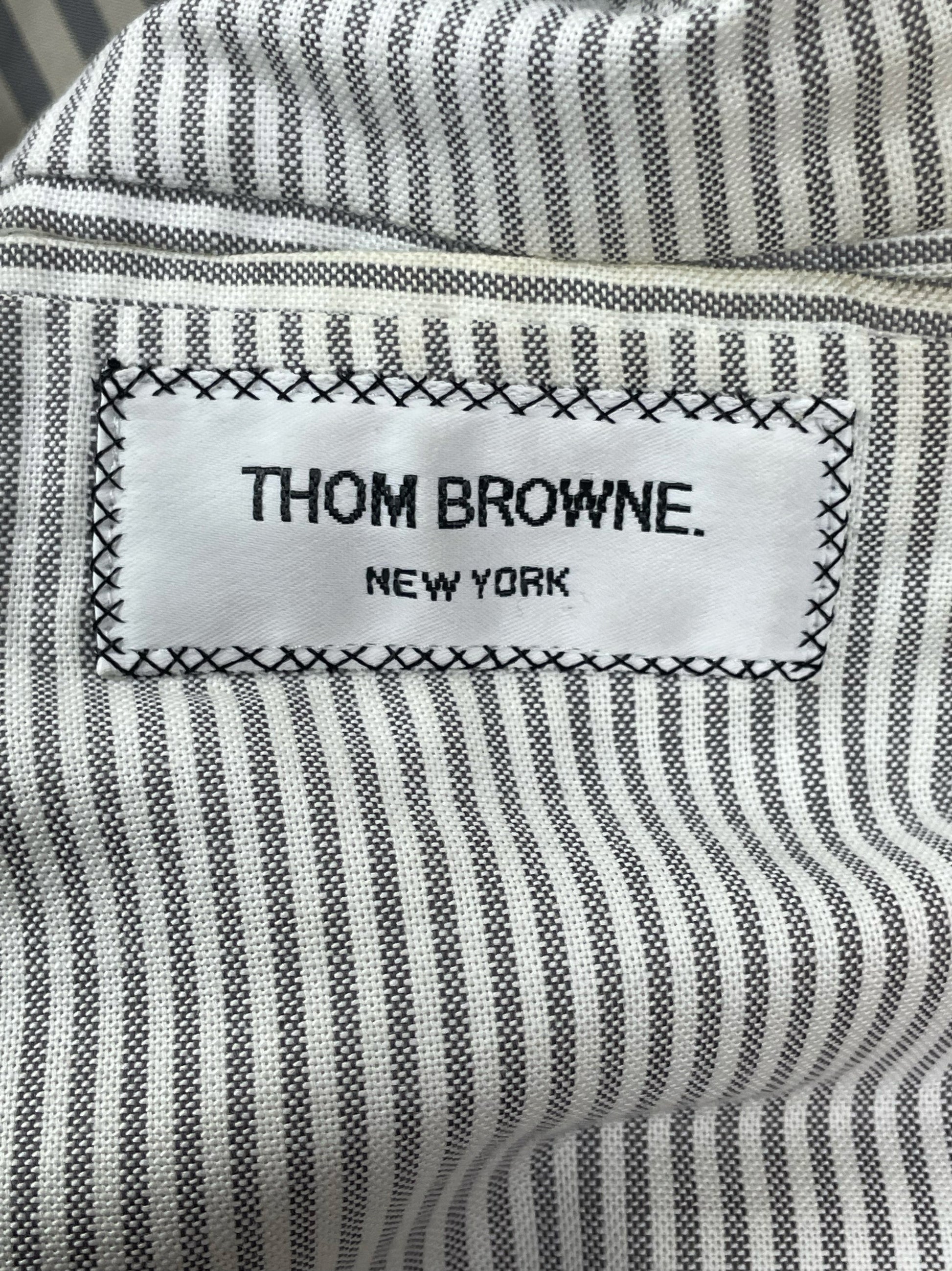Thom Browne New York woven label on camel hair car coat