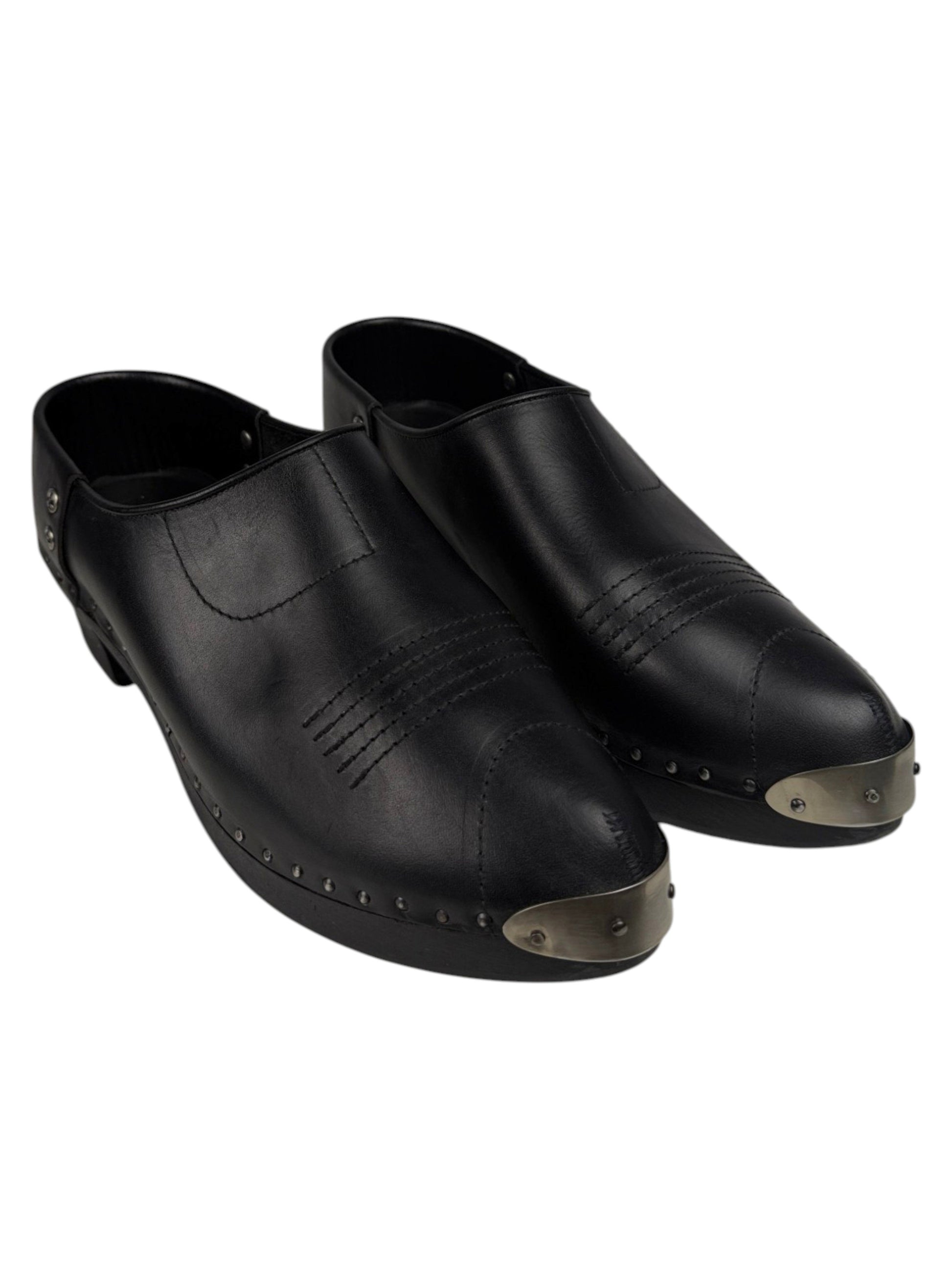 Paired Enfants Riches Déprimés leather clog mules with metal toe caps and wooden platform