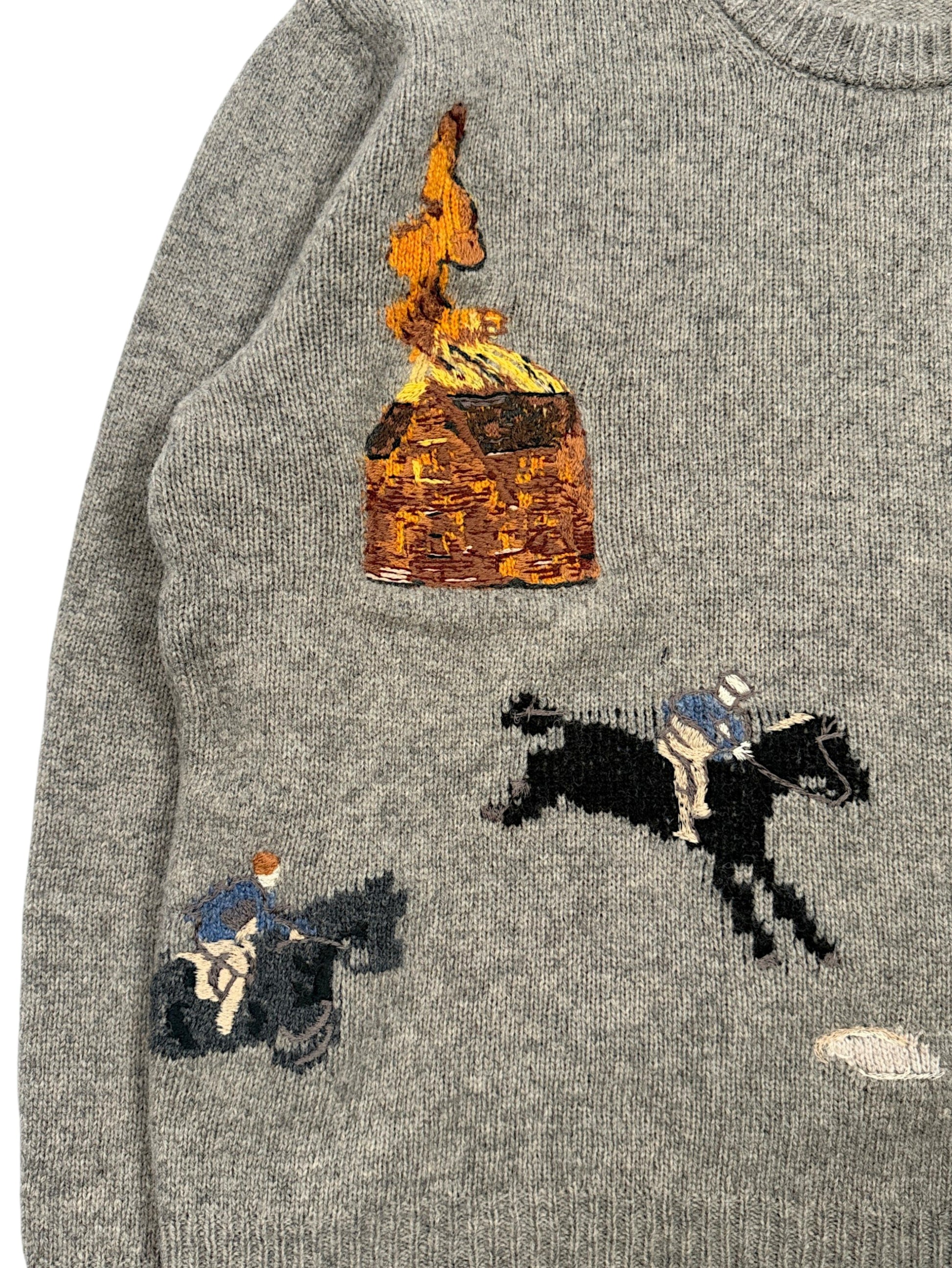 Hand-embroidered campfire and jockey scene on ERD Shetland wool sweater
