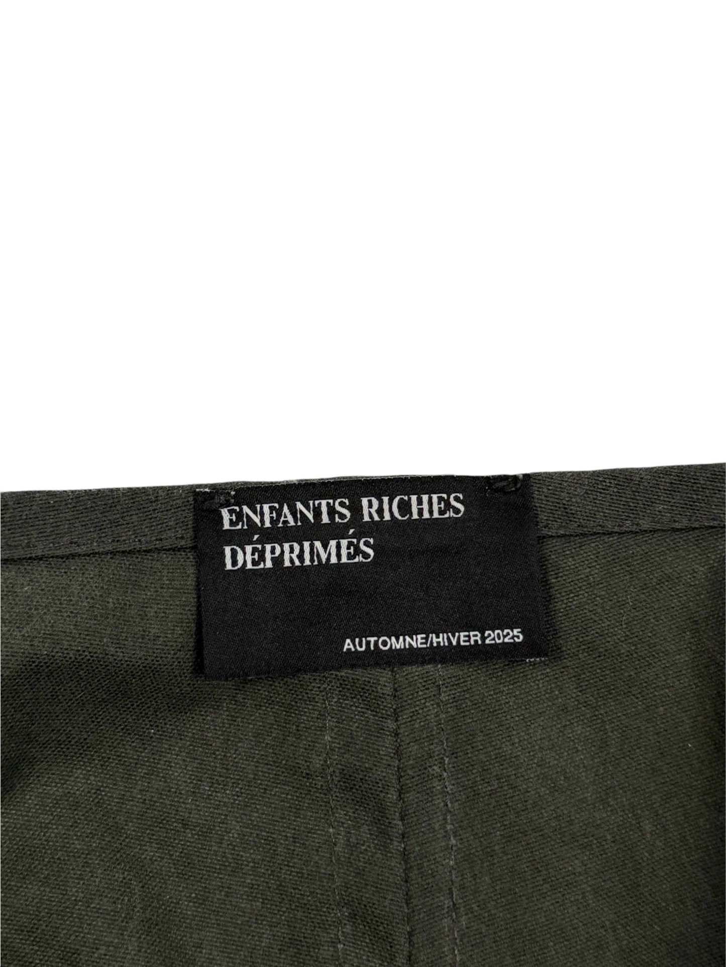 Enfants Riches Déprimés Automne Hiver 2025 woven brand label olive waxed cotton