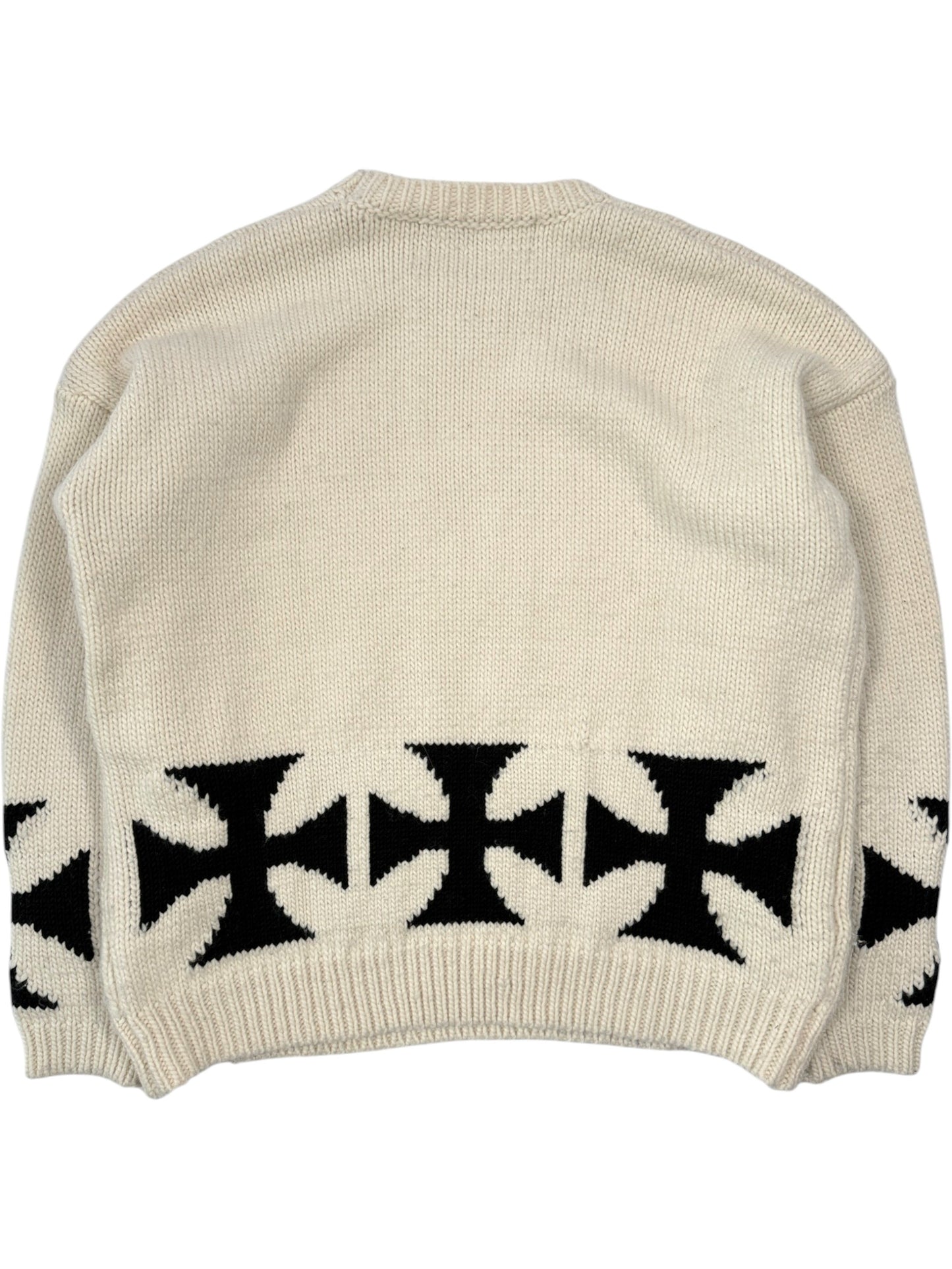 Black intarsia iron cross motifs along hem of ERD cream merino wool sweater