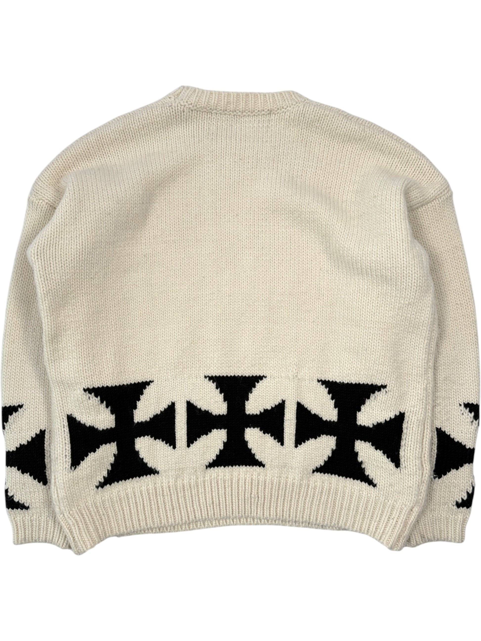 Black intarsia iron cross motifs along hem of ERD cream merino wool sweater
