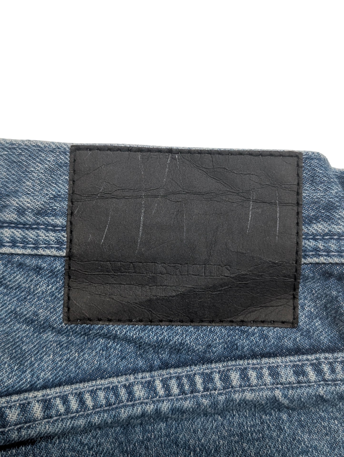 Distressed Patchwork Graphic Jeans