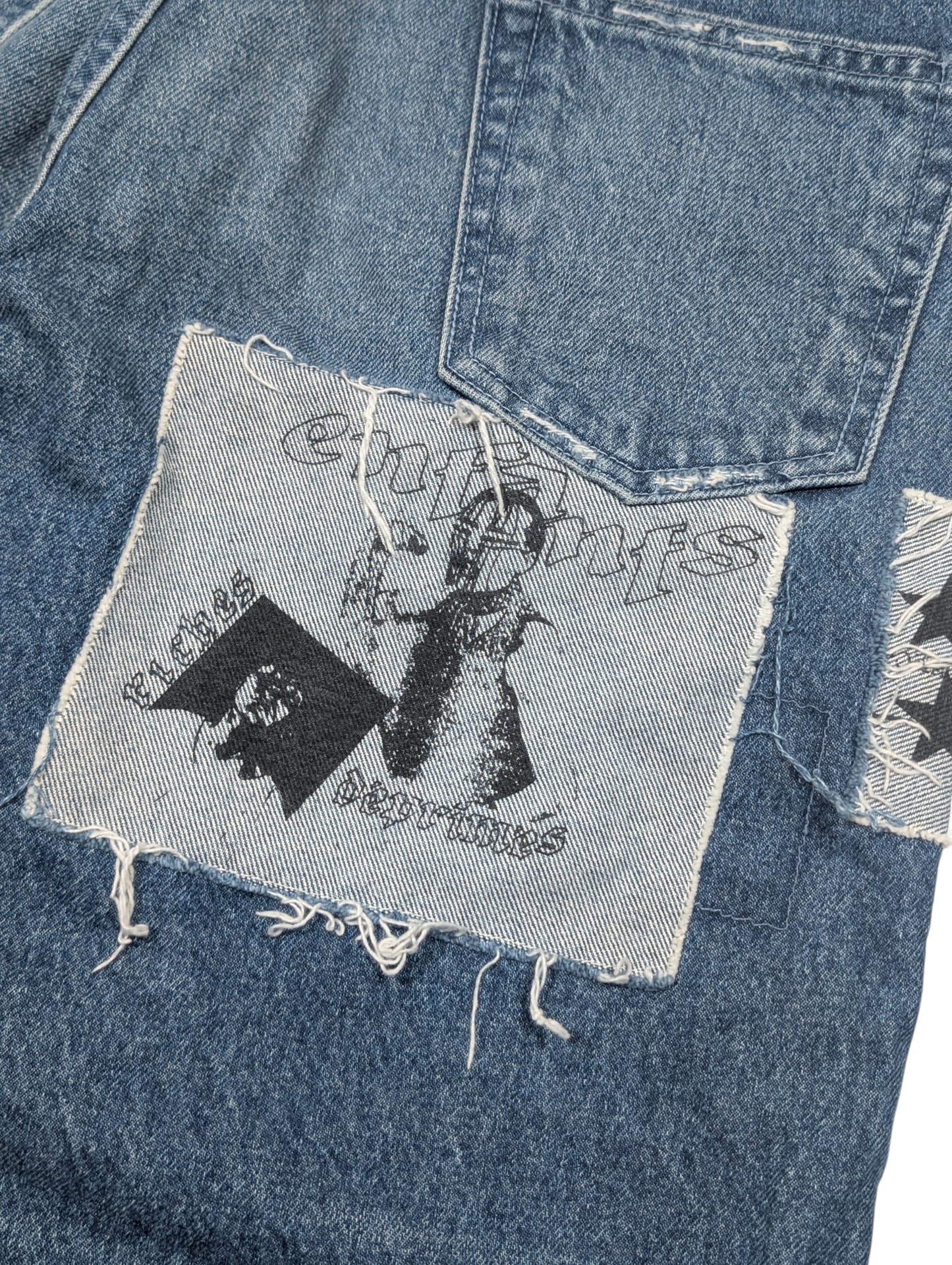 Distressed Patchwork Graphic Jeans