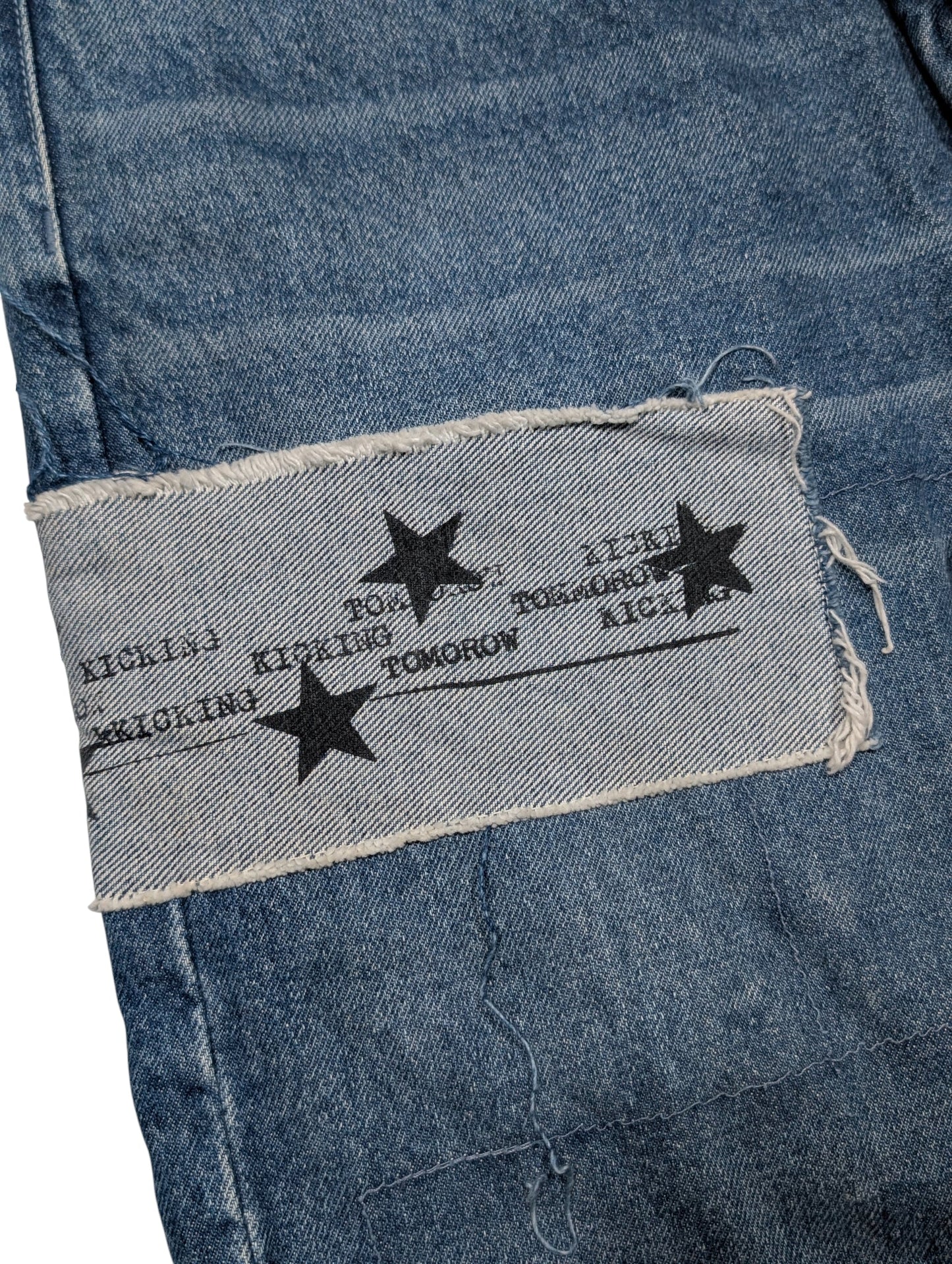 Distressed Patchwork Graphic Jeans