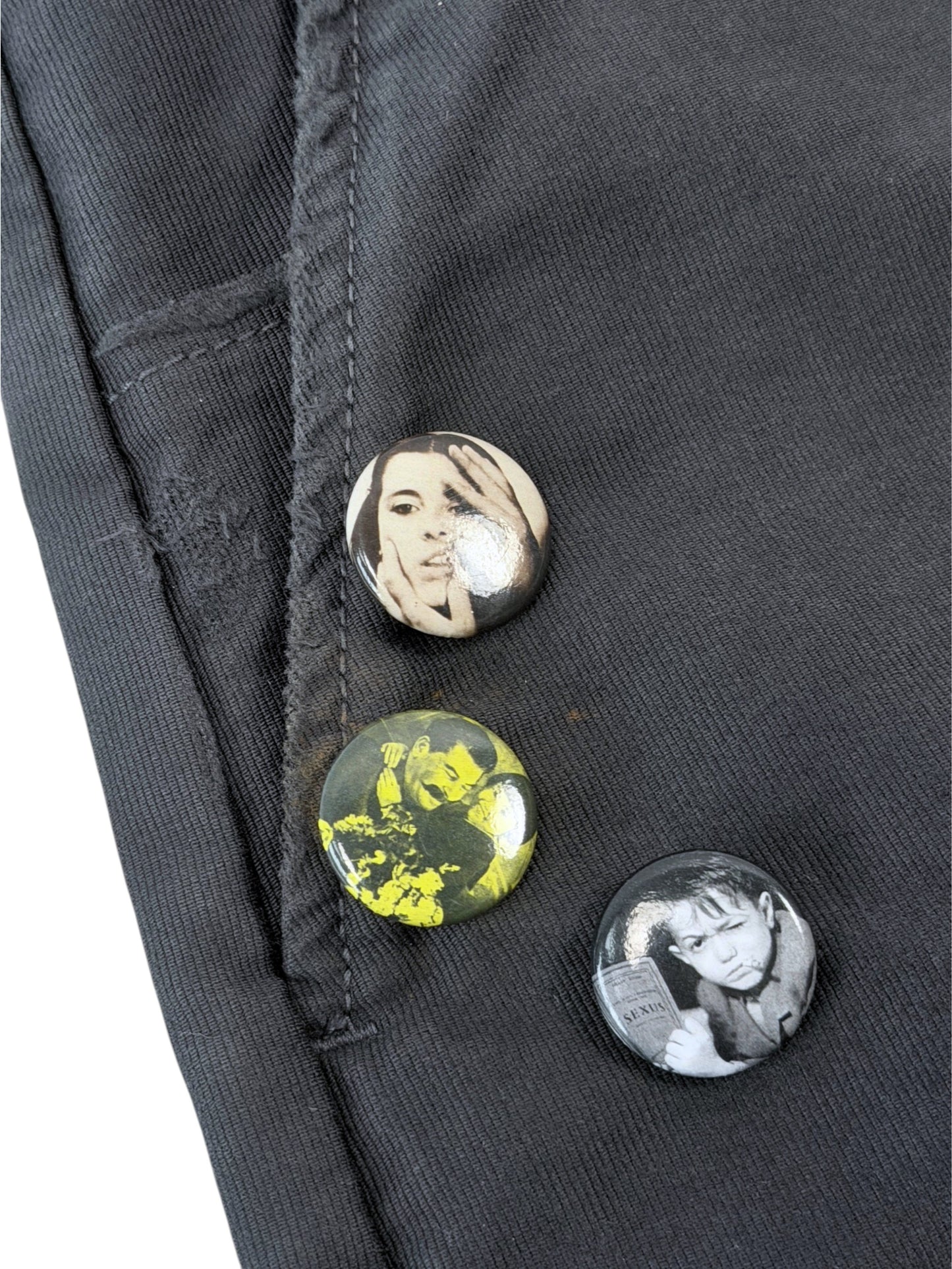 Photo pin badges pinned to Enfants Riches Déprimés Swiss Auto Dicky grey pants