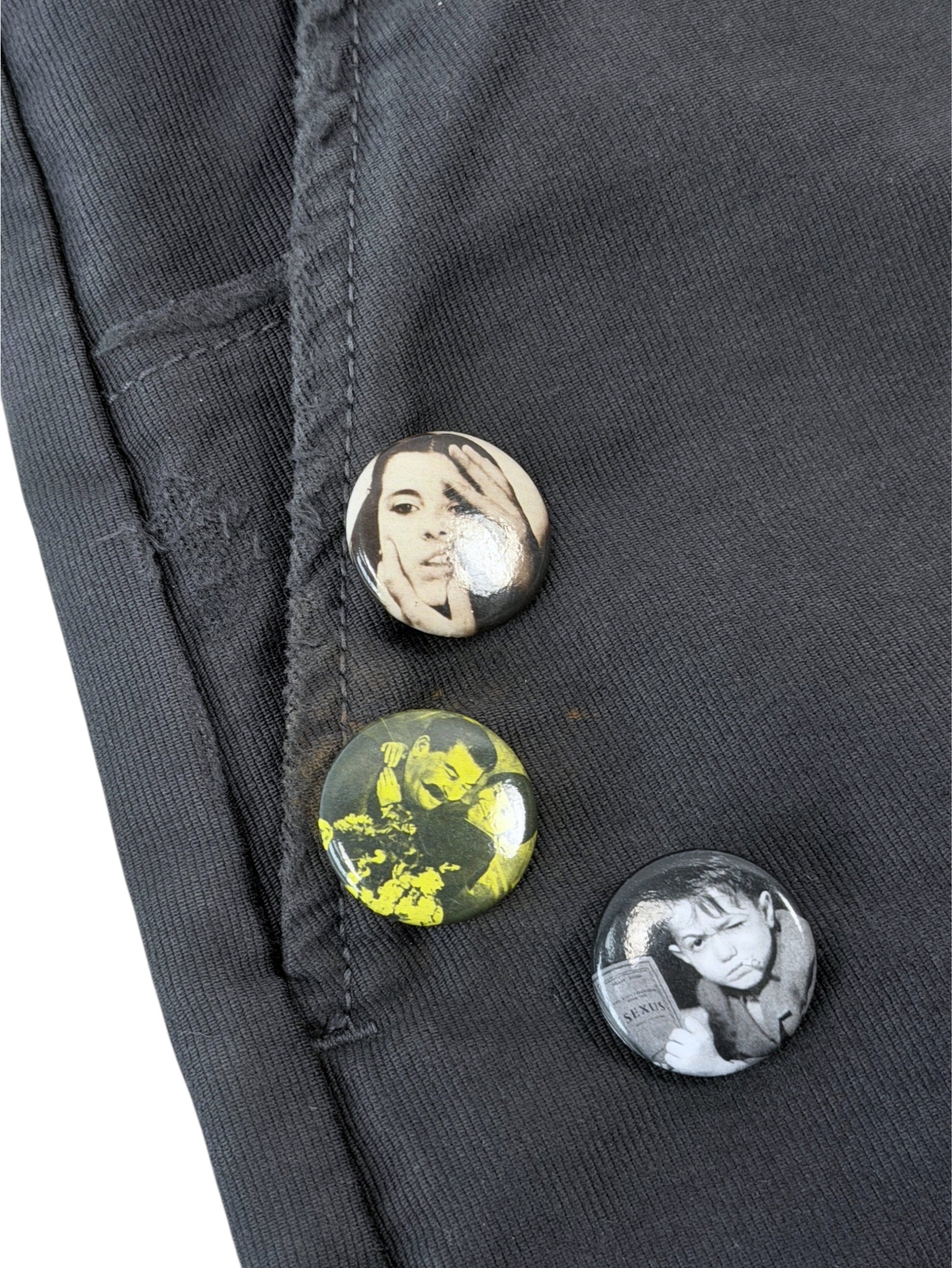 Photo pin badges pinned to Enfants Riches Déprimés Swiss Auto Dicky grey pants