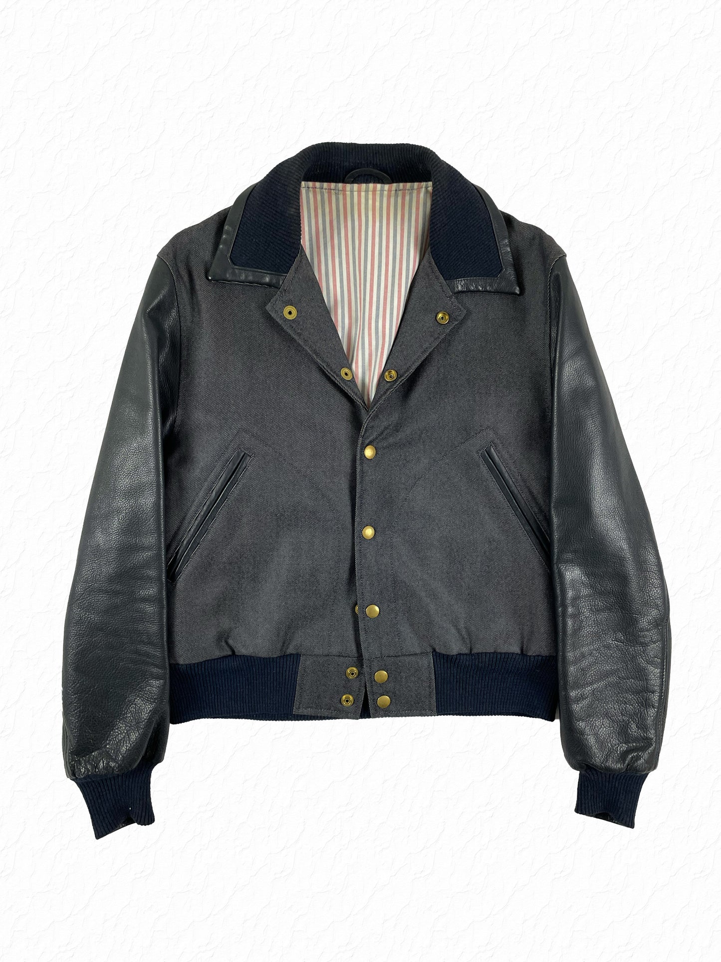 Thom Browne navy denim varsity jacket with black leather sleeves